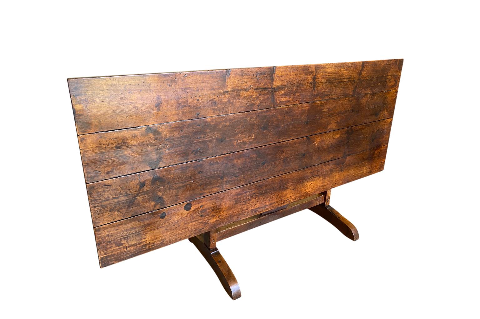 Exceptional and very rare 19th century Table Vigneron - Wine tasting Table from the Provence region of France. This very unique Wine Tasting Table is of an unusual rectangular shape, soundly constructed from richly stained pine. Sensational patina.