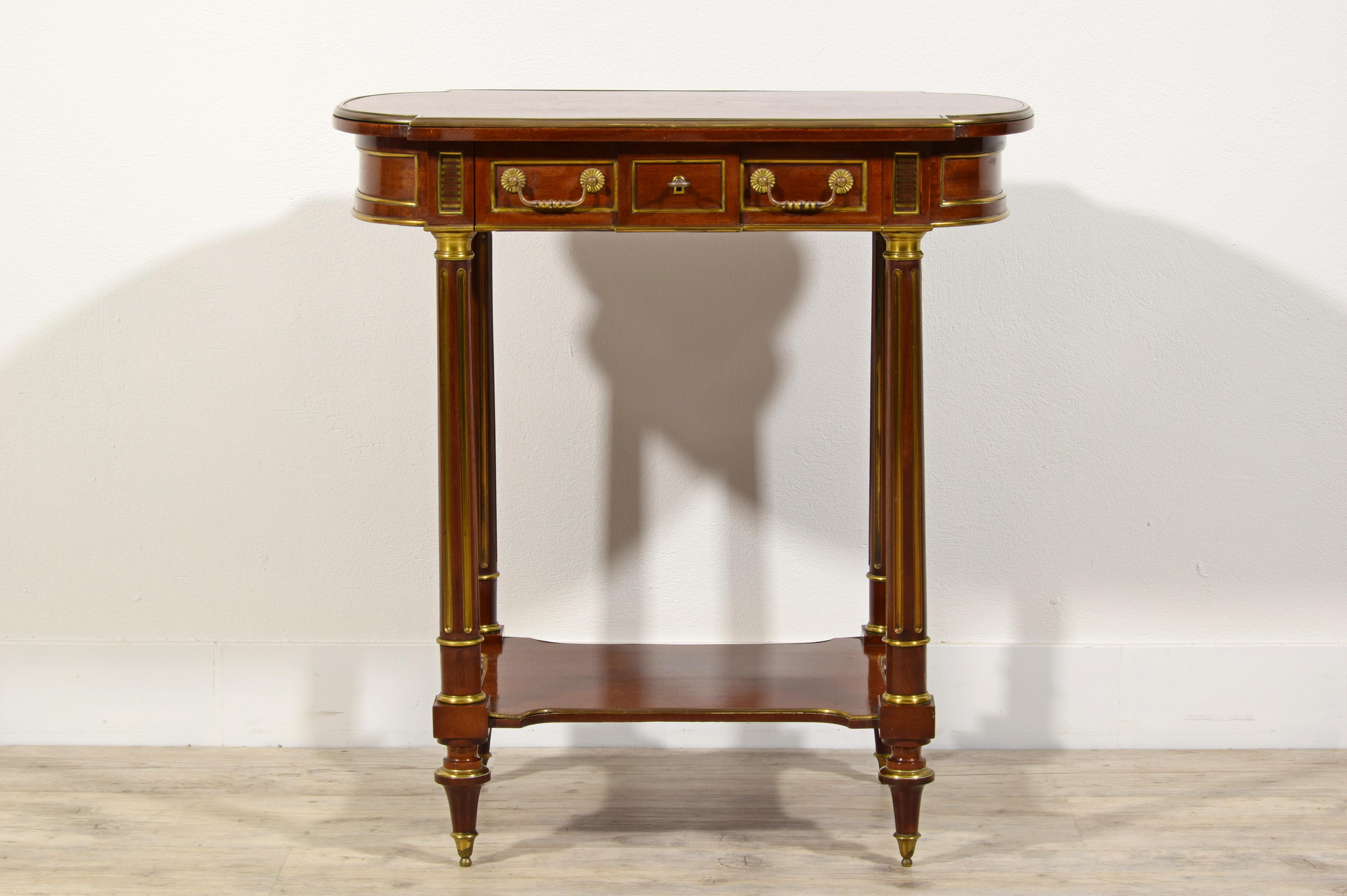 19Th Century, French Wood and Gilt Bronze Centre Table 
Measures: cm L 69 x P 41 x H 73. The legs have a max width of cm 48.5 x P 39

The center table dates back to the early nineteenth century, French manufacture.
In wood, it consists of a