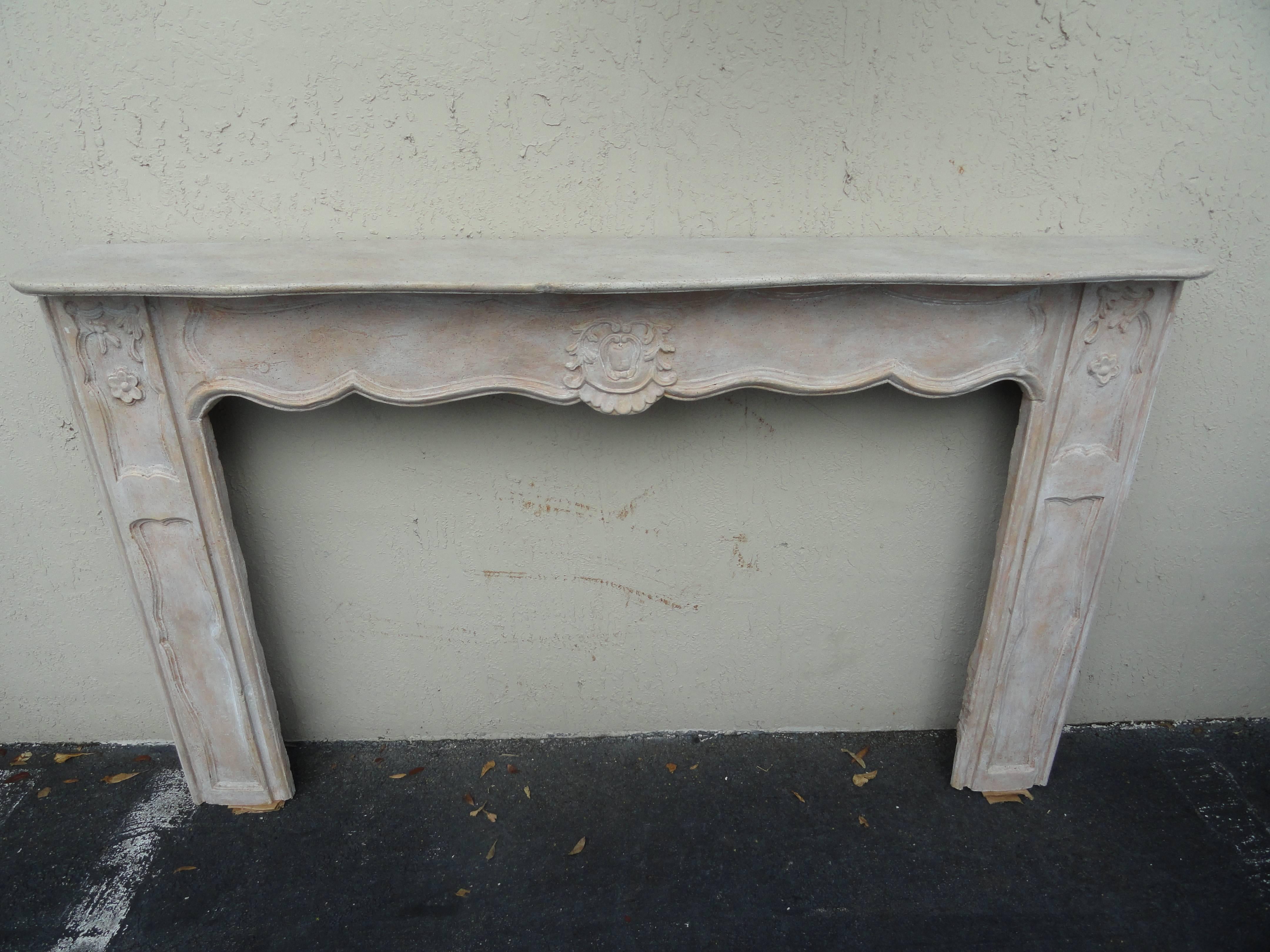 19th century French wood hand-carved fireplace surround. Walnut and oak. One-piece.
20th century finish. Large-scale.
Outside dimensions: 76.5