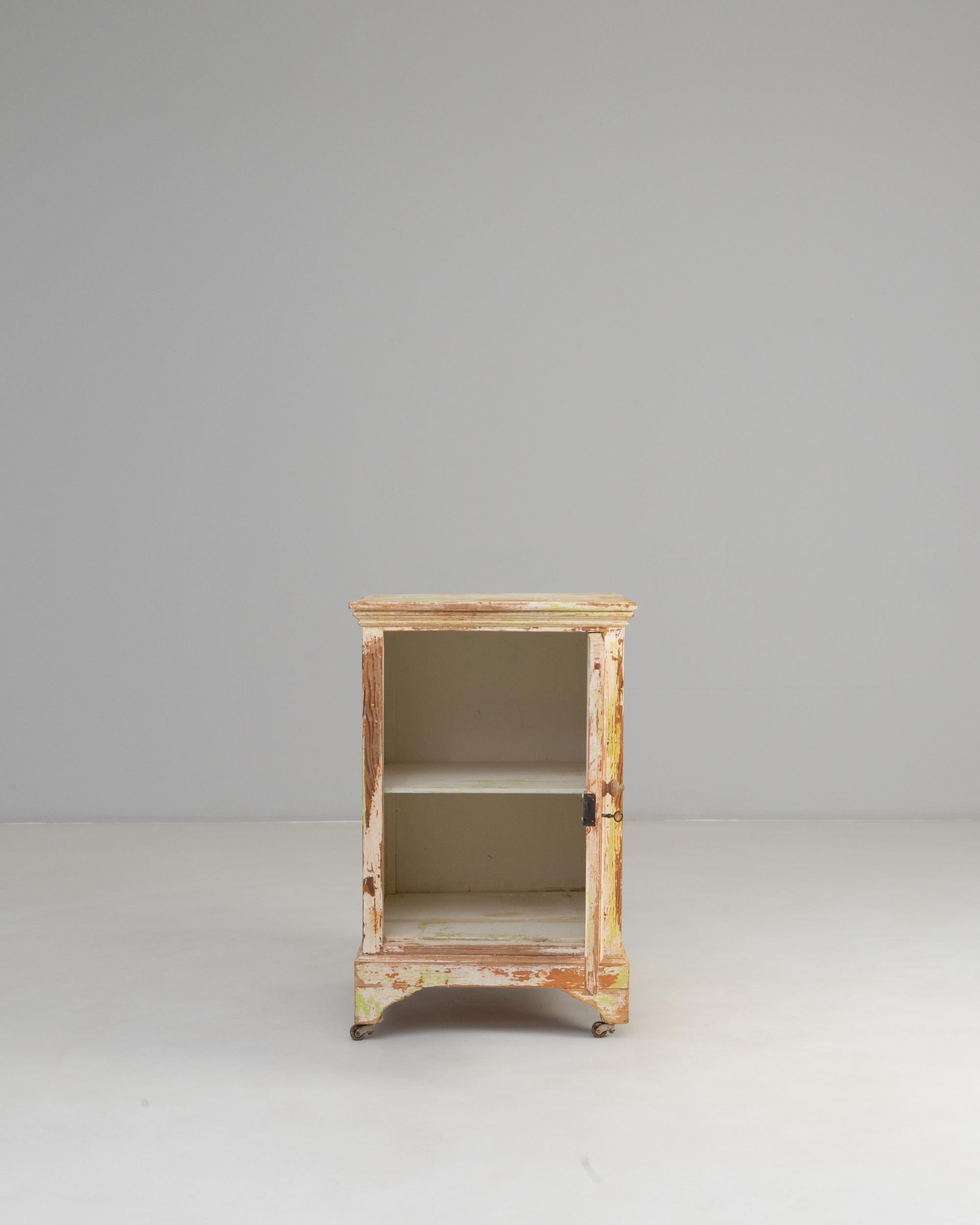 Francese 19th Century French Wood Patinated Cabinet With Wheels in vendita