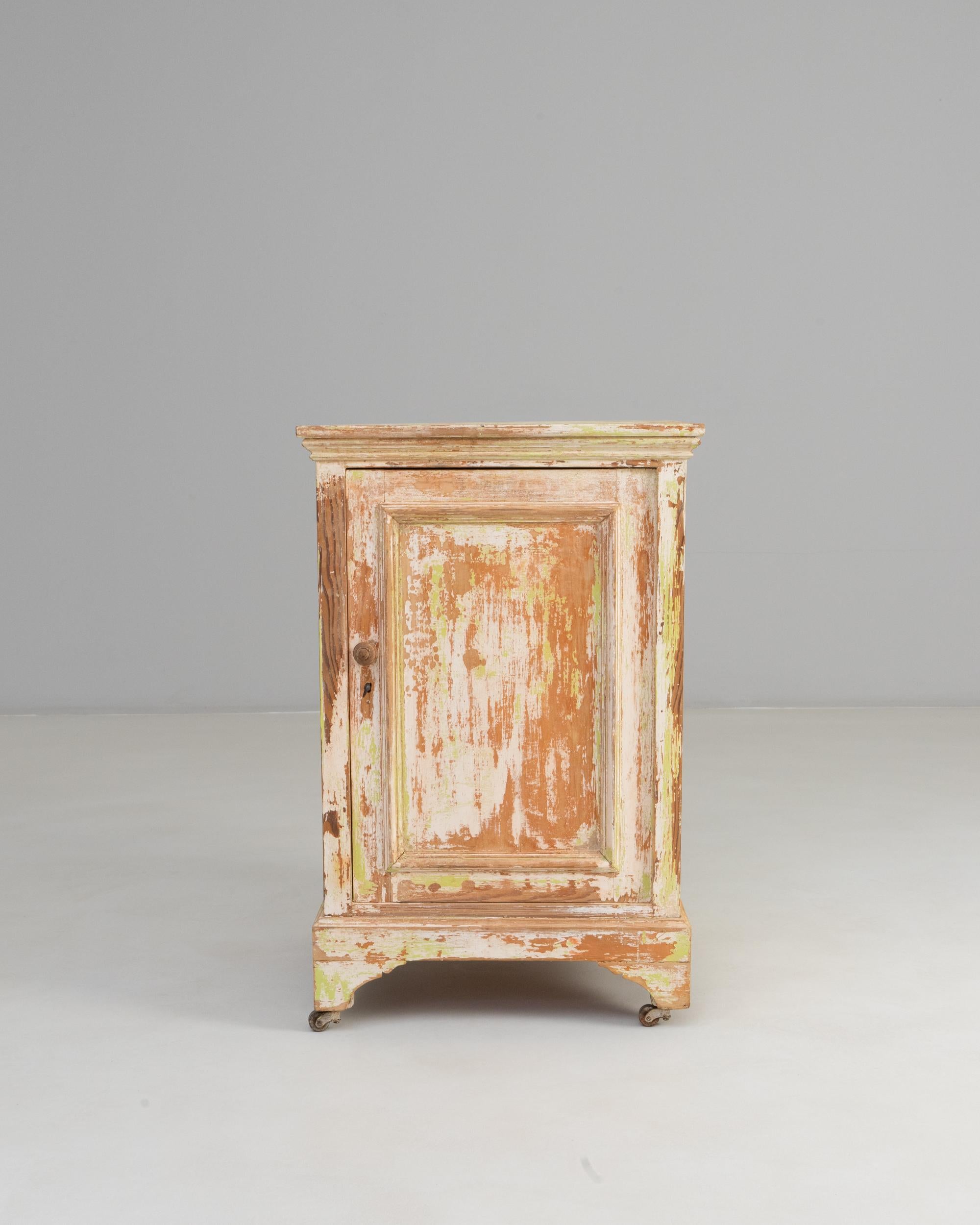 XIX secolo 19th Century French Wood Patinated Cabinet With Wheels in vendita