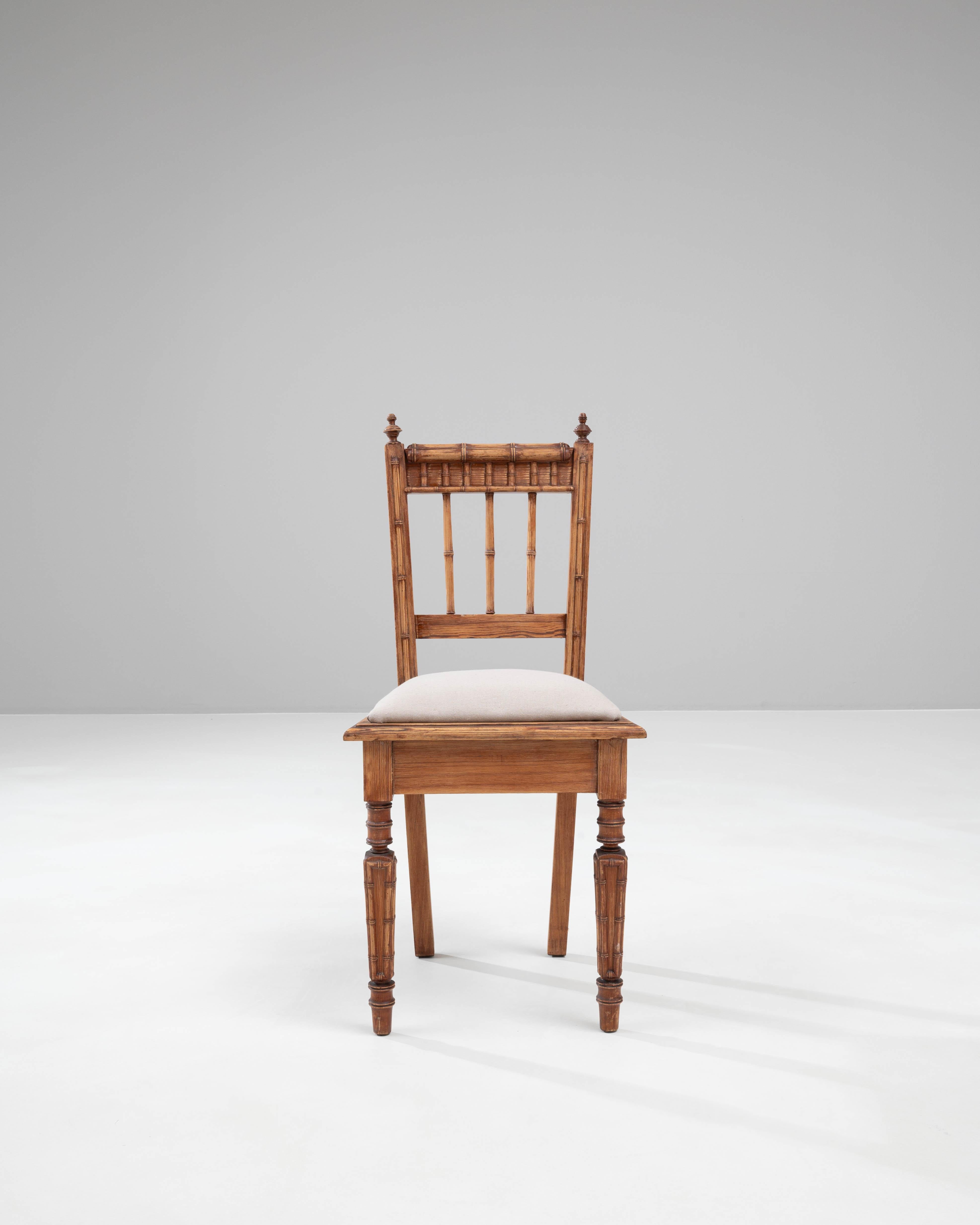 Step back in time with this authentic 19th-century French wooden chair, a piece that perfectly encapsulates the charm and elegance of historical French furniture design. Crafted from rich, durable wood, this chair features intricate detailing,