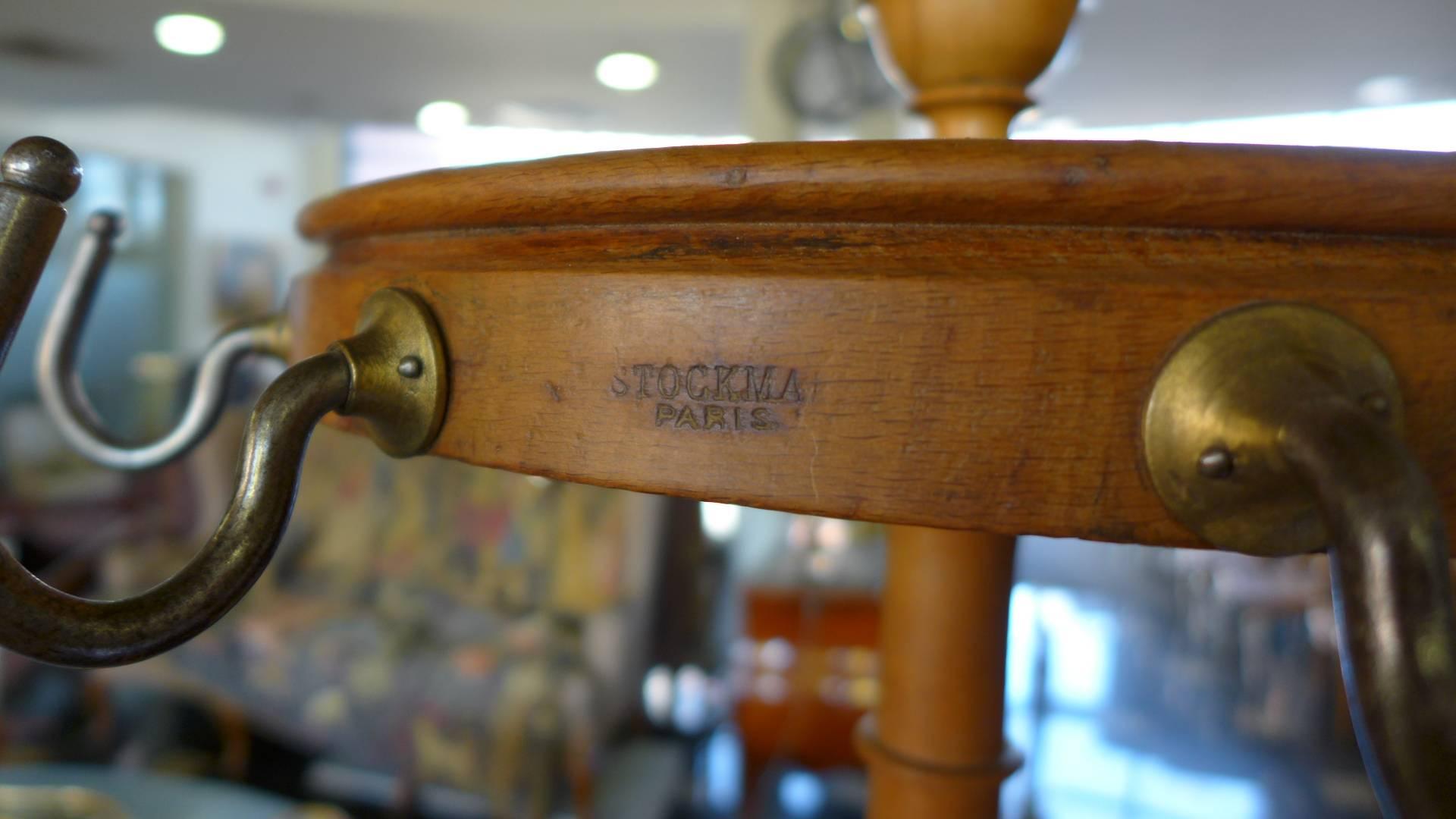 Unusual late 19th century wooden coat hanger from Stockman Paris with original stamp. 
France, circa 1890.