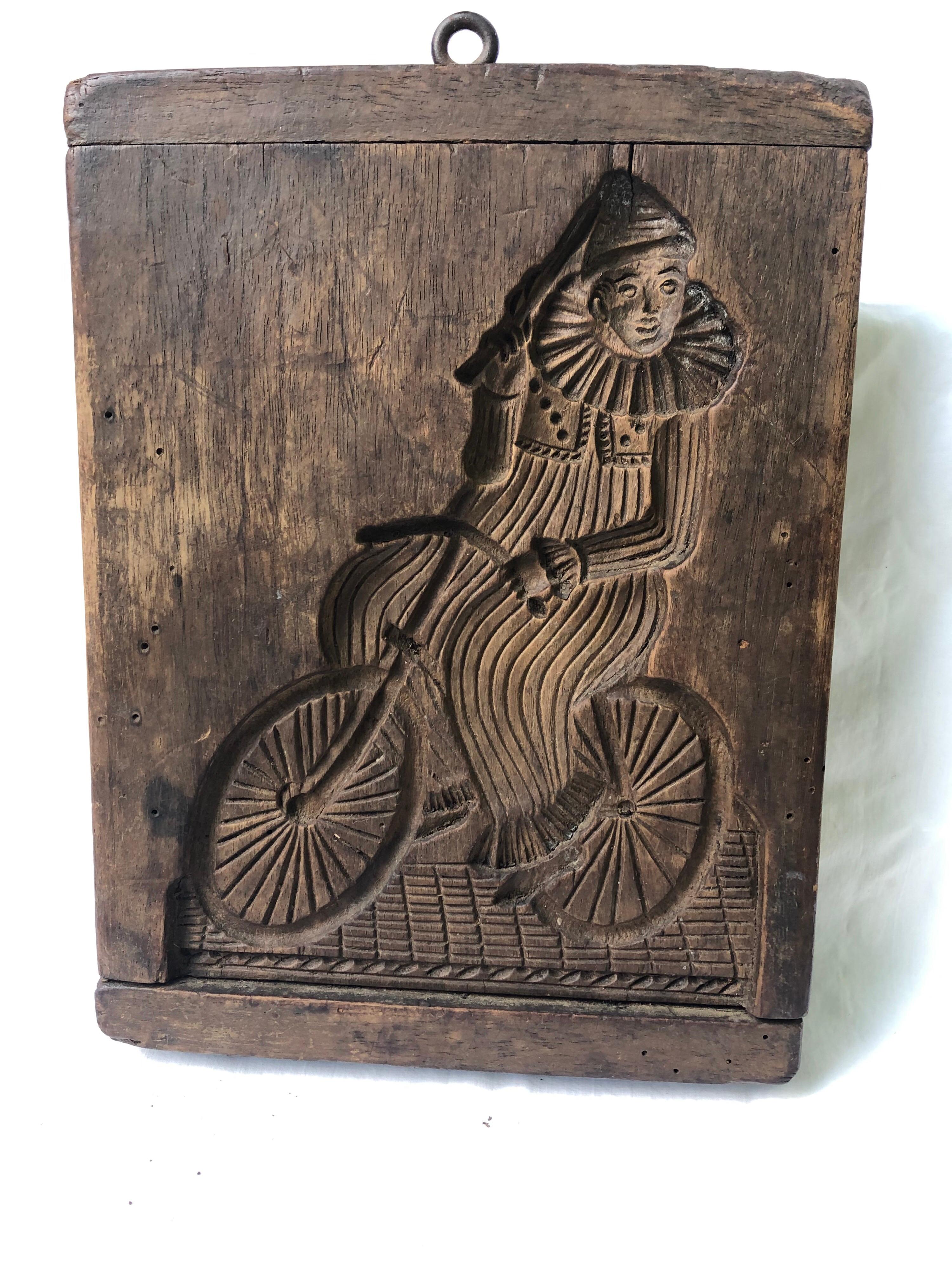 French 19th Century Wooden Cookie Mold, Clown on a Bicycle In Good Condition For Sale In Hudson, NY