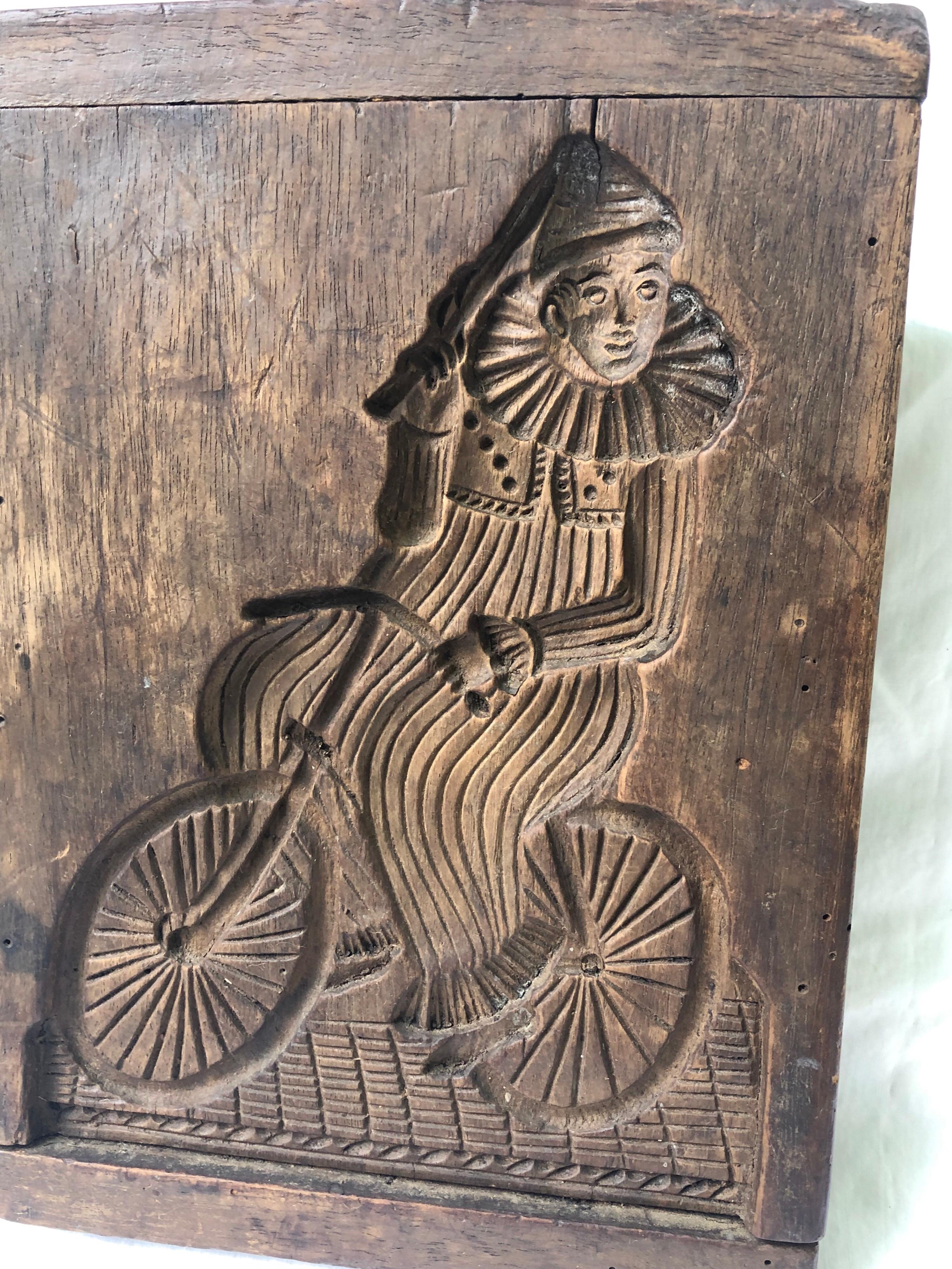 Late 19th Century French 19th Century Wooden Cookie Mold, Clown on a Bicycle For Sale
