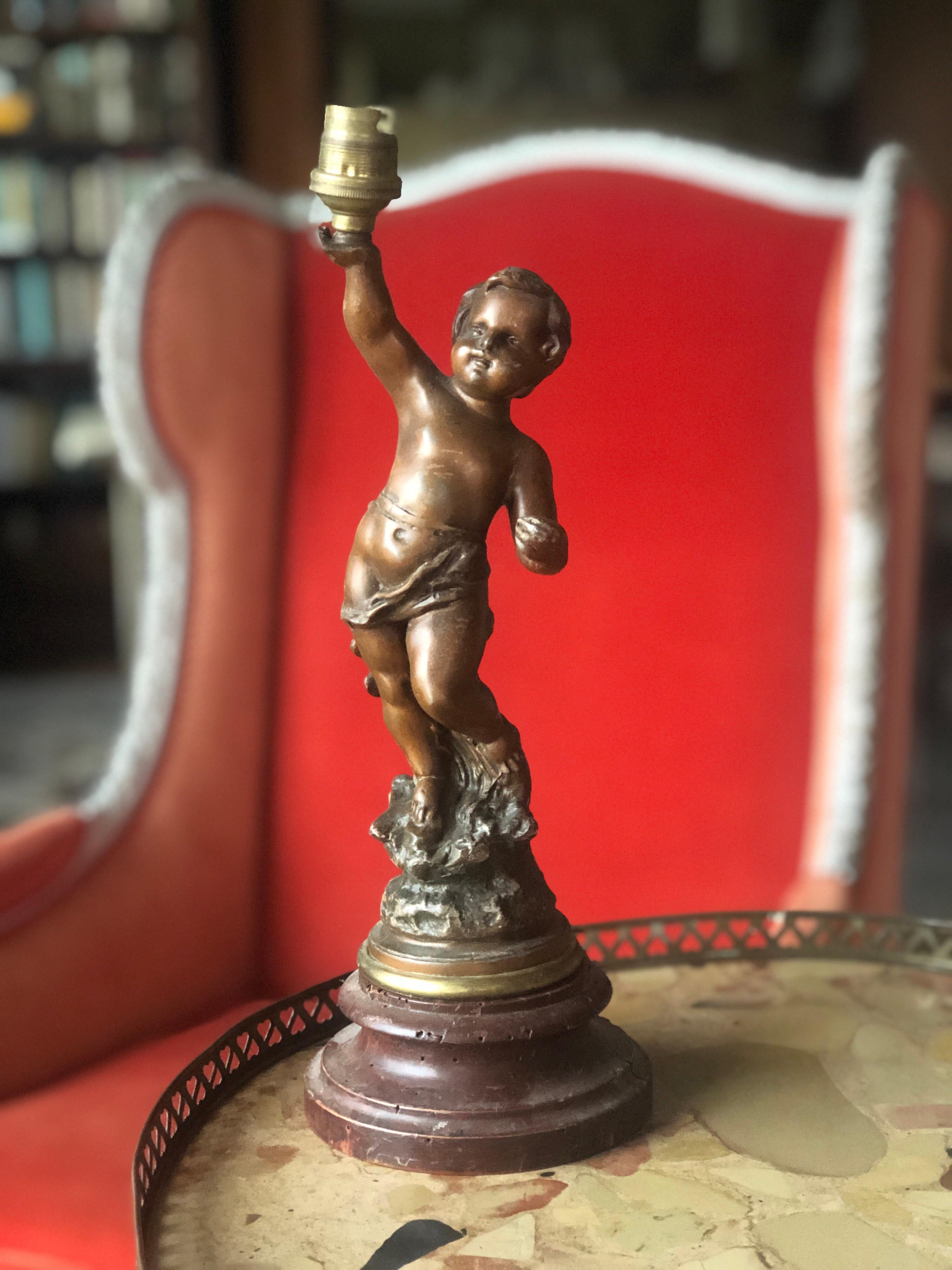Hand-Carved 19th Century French Wooden Table Lamp with Raised Cherub