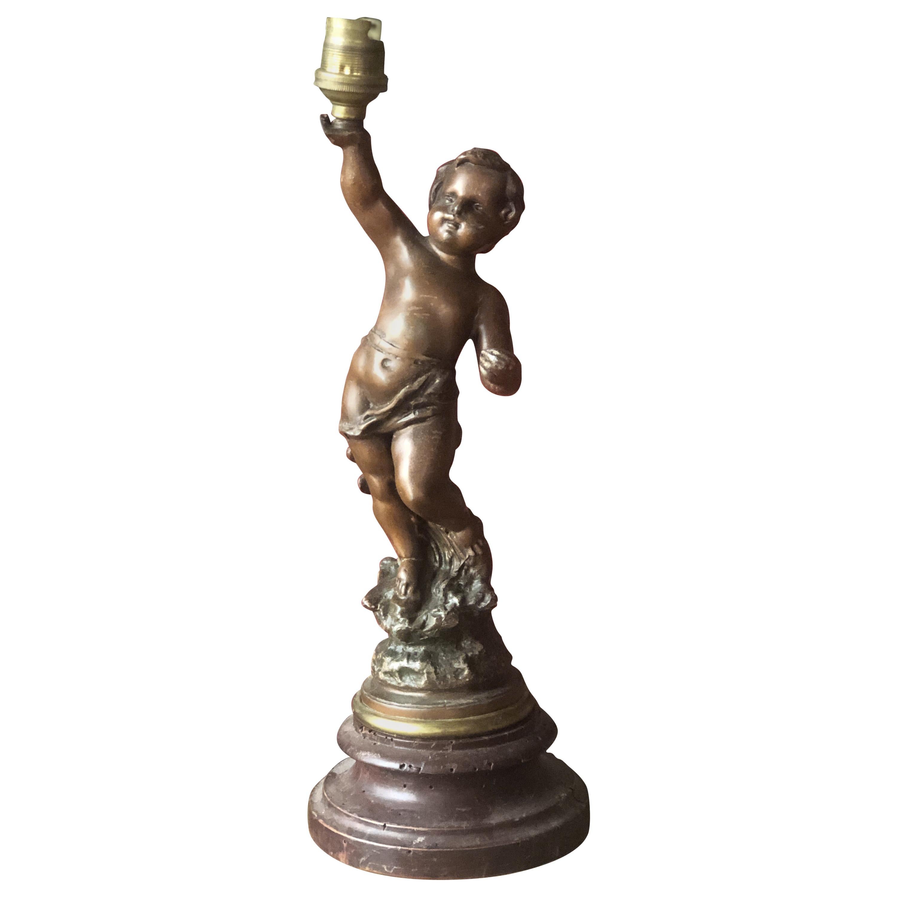 19th Century French Wooden Table Lamp with Raised Cherub