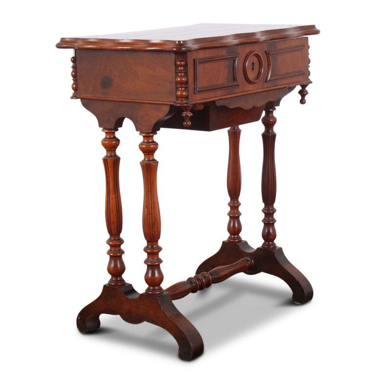 A French sewing, or work, table with turned legs, the top opening to a fitted bird’s-eye maple interior, and with a lower pullout drawer.



 

  