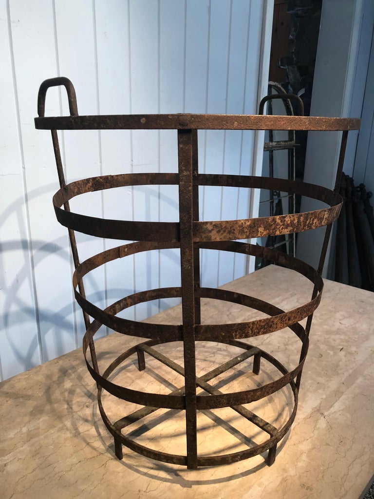 An unusual item we picked up in the Southwest of France, this 19th century handmade laundry basket is a beauty. Featuring all handmade wrought iron with riveted construction, it has two handles for easy transport and is in beautiful condition. It