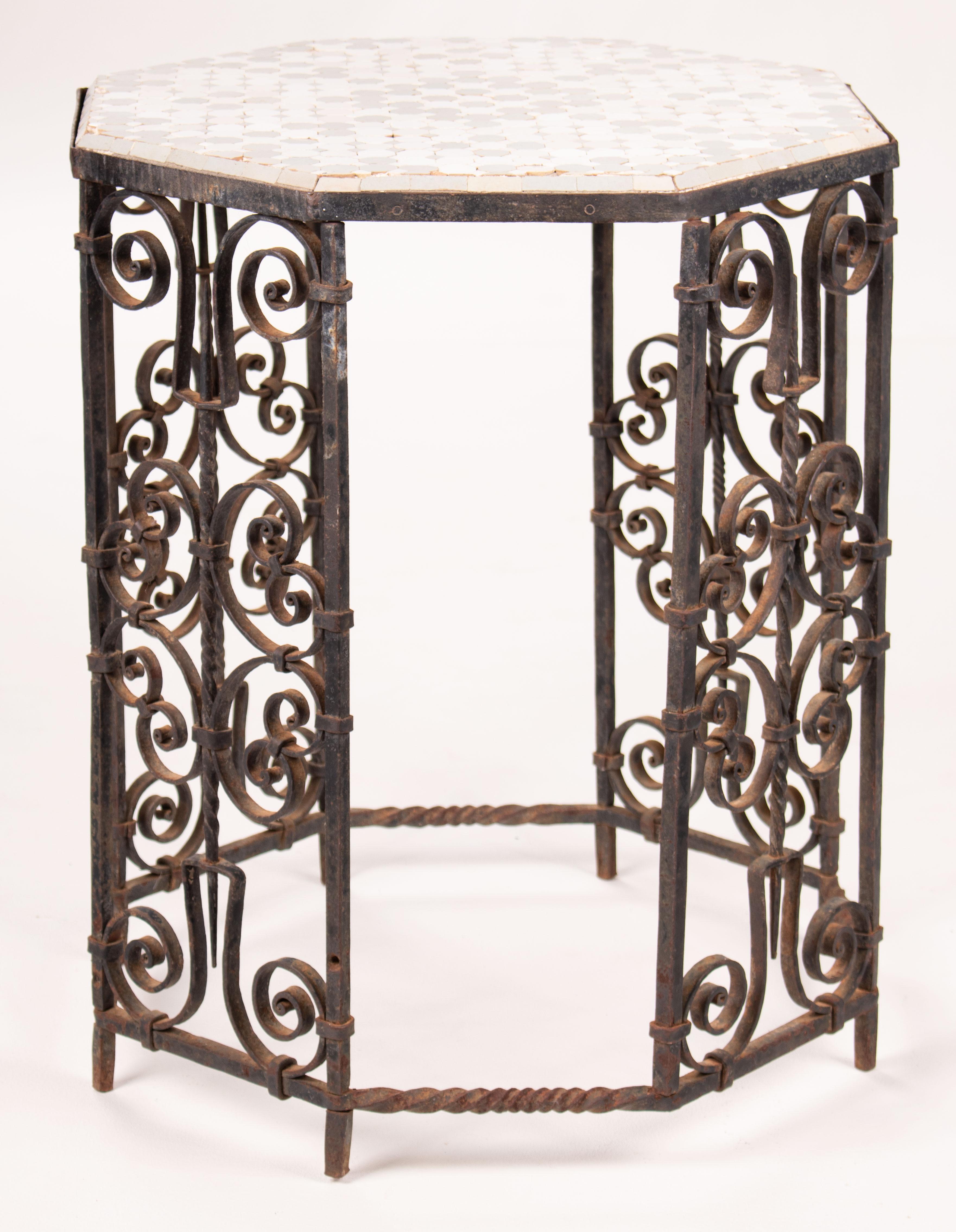 19th century French wrought iron octagonal ceramic top table.