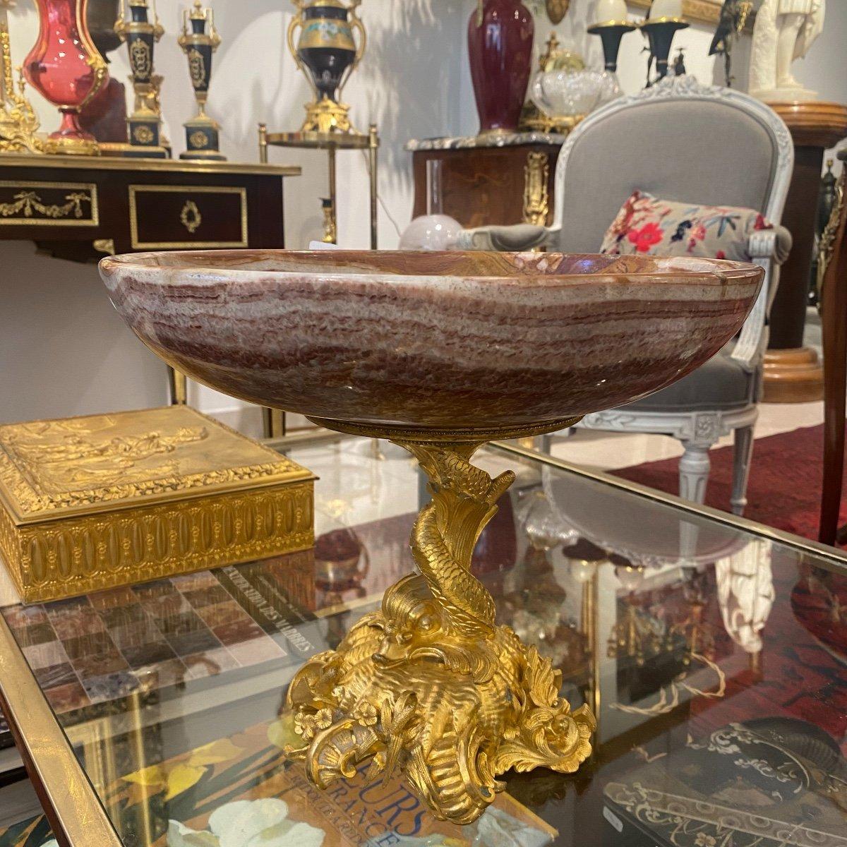 We present you with this unique, rare and truly beautiful fruit bowl, crafted from thick veined red-brown marble, elegantly presented on a late 19th-century gilded bronze stand. Originating from the Napoleon III era, spanning from 1852 to 1870, the