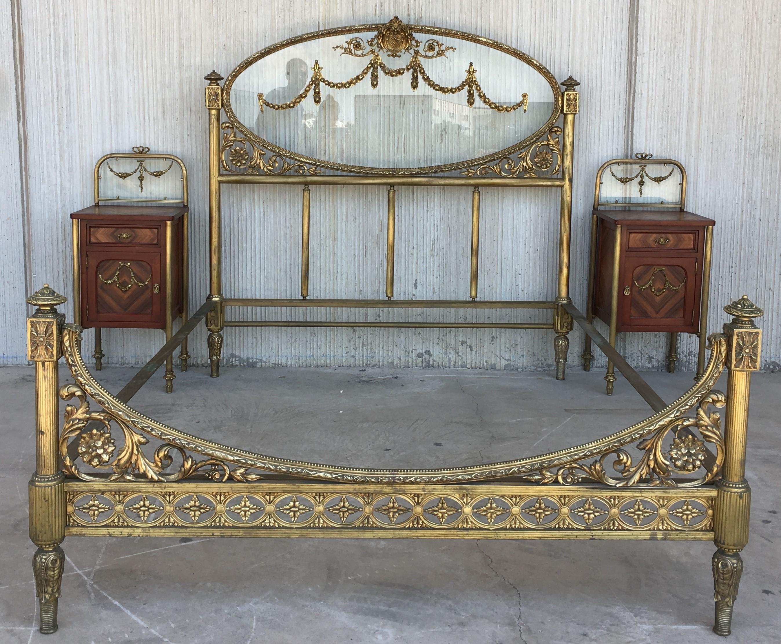Beautiful and impressive 19th century full bedroom set
French Belle Époque bronze, iron, brass and glass in the headboard and nightstands

You can change the bed slats for adapt it a queen bed.