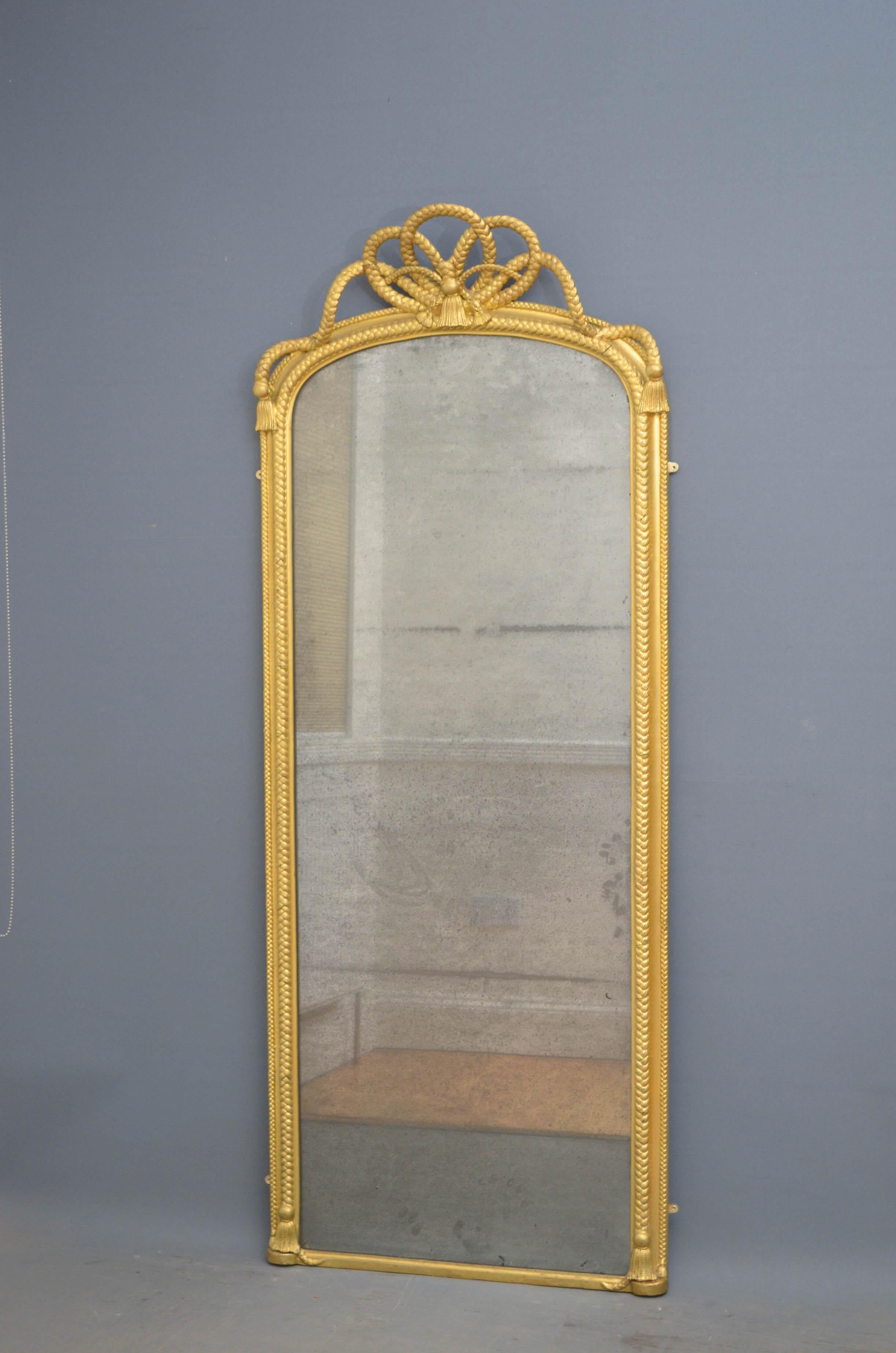 Sn4603, stylish Victorian floor standing or wall hanging mirror with original extensively foxed glass in rope decorated frame with large rope bow to the top and tassels to base. This mirror has been refinished in the past, all in wonderful condition