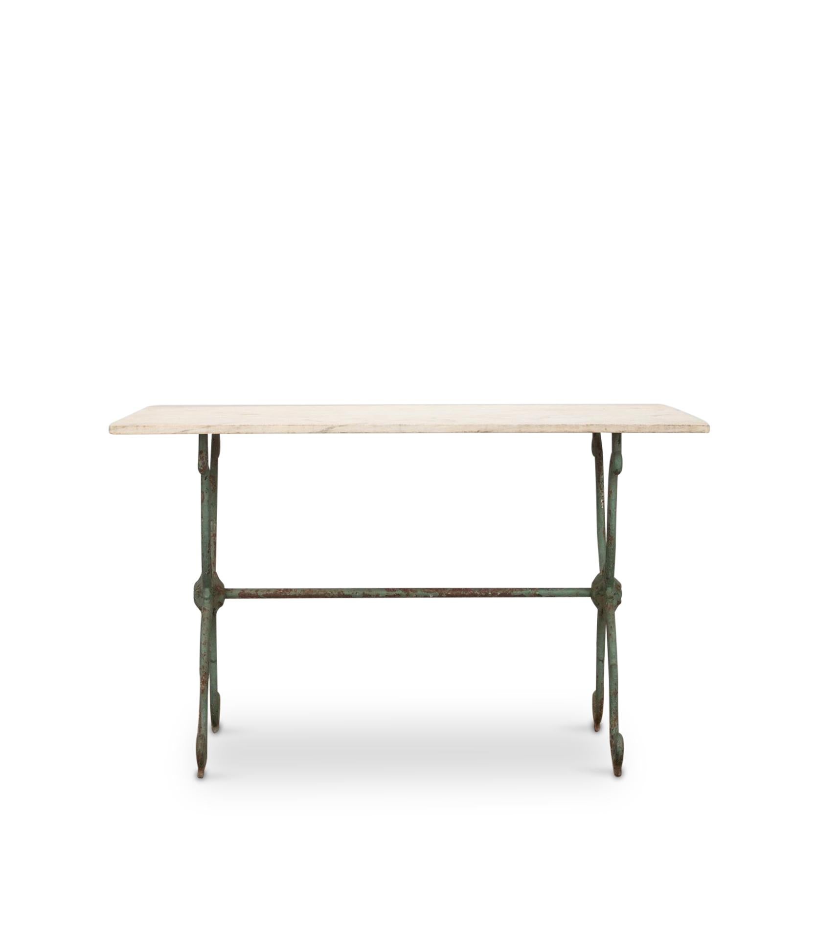 Wonderful 19th Century French garden table.

Features two scroll framed supports in original green paint that support the marble top which has the most amazing patina. This super table would work perfectly as both an interior or garden piece.