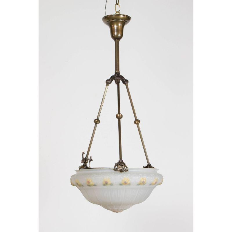 Original Gas Fixture has been electrified and adapted with a multiple light cluster, brass and cast iron. Original Glass with reverse painted flowers. Has been completely restored with a light antique patina, and rewired. ready to