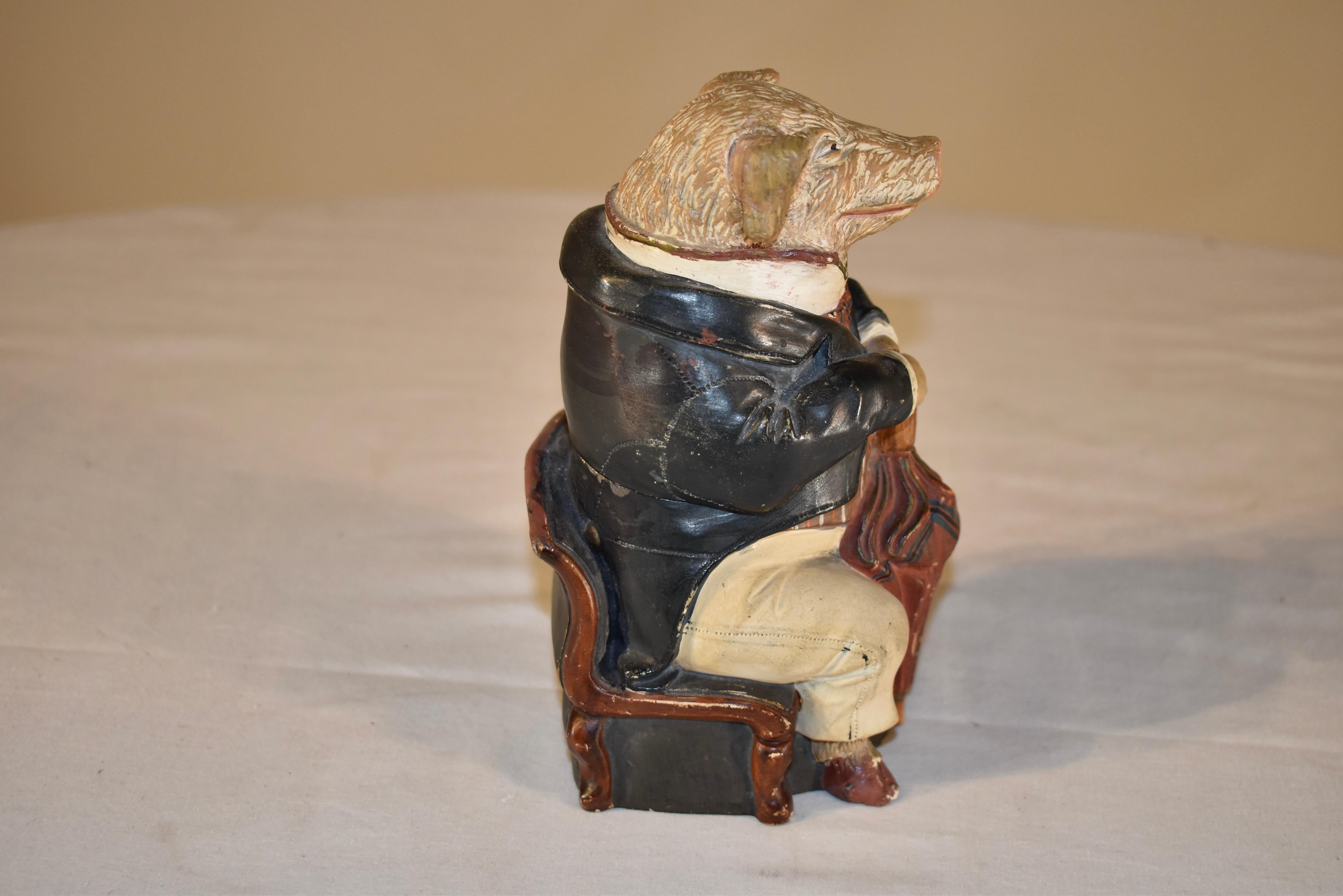 RARE 19th century signed Johann Maresh tobacco jar in the form of a gentleman pig. This is one of those wonderful tobacco boxes you look for to be the star of your collection. He is so whimsical seated with his umbrella! He has a plaid waistcoat and