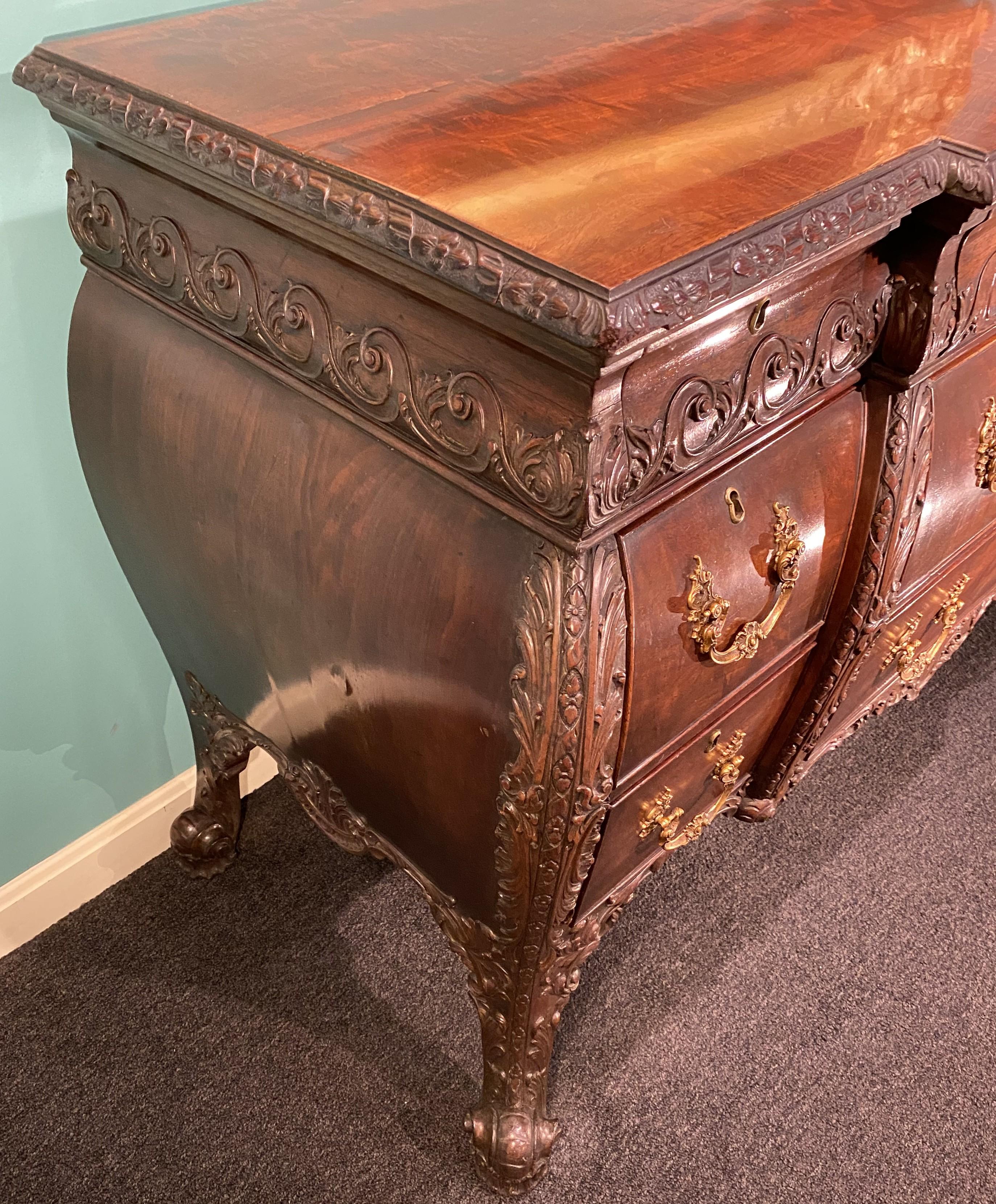 English 19th Century George II Style Carved Mahogany Commode in the Bombe Form For Sale