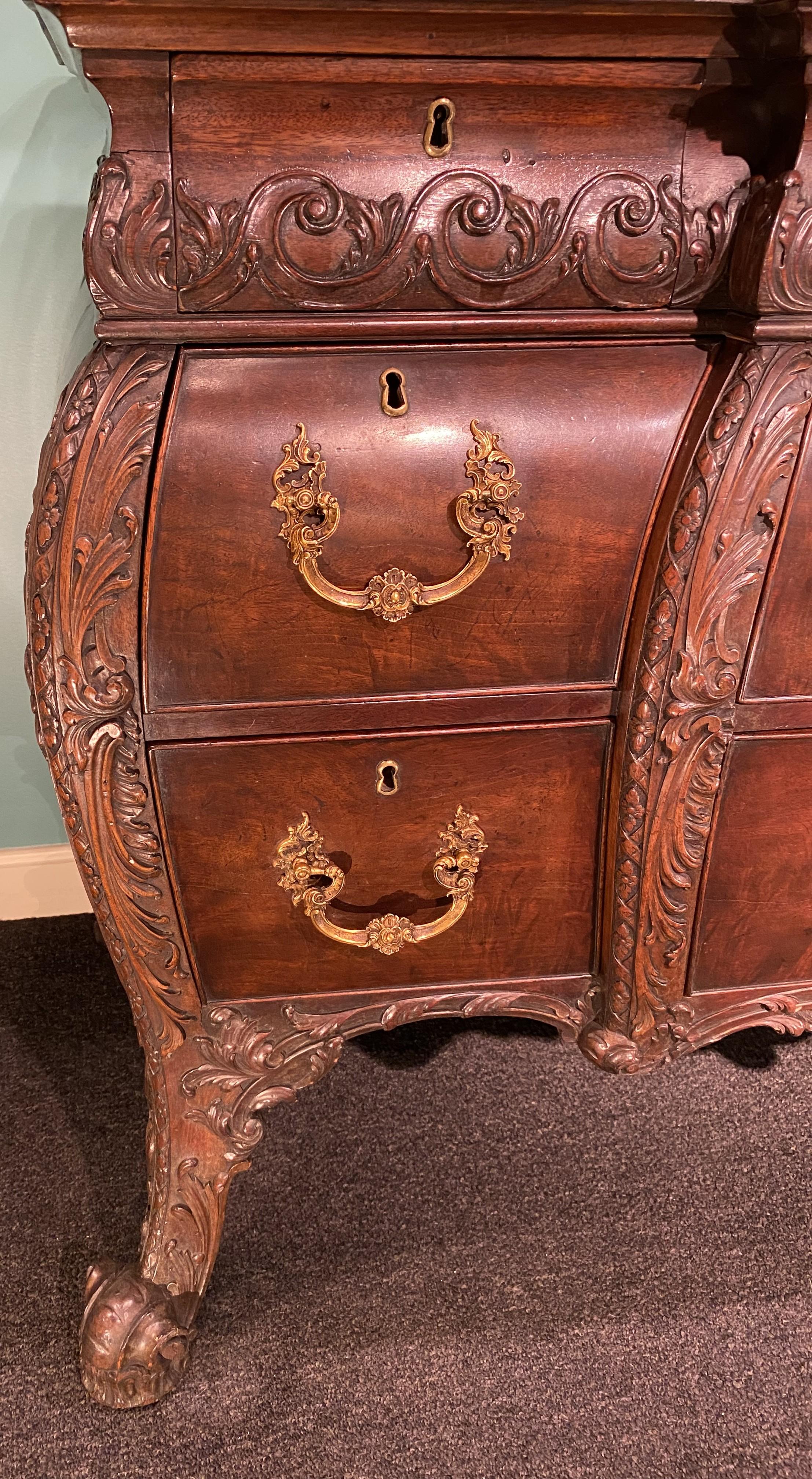 Hand-Carved 19th Century George II Style Carved Mahogany Commode in the Bombe Form For Sale