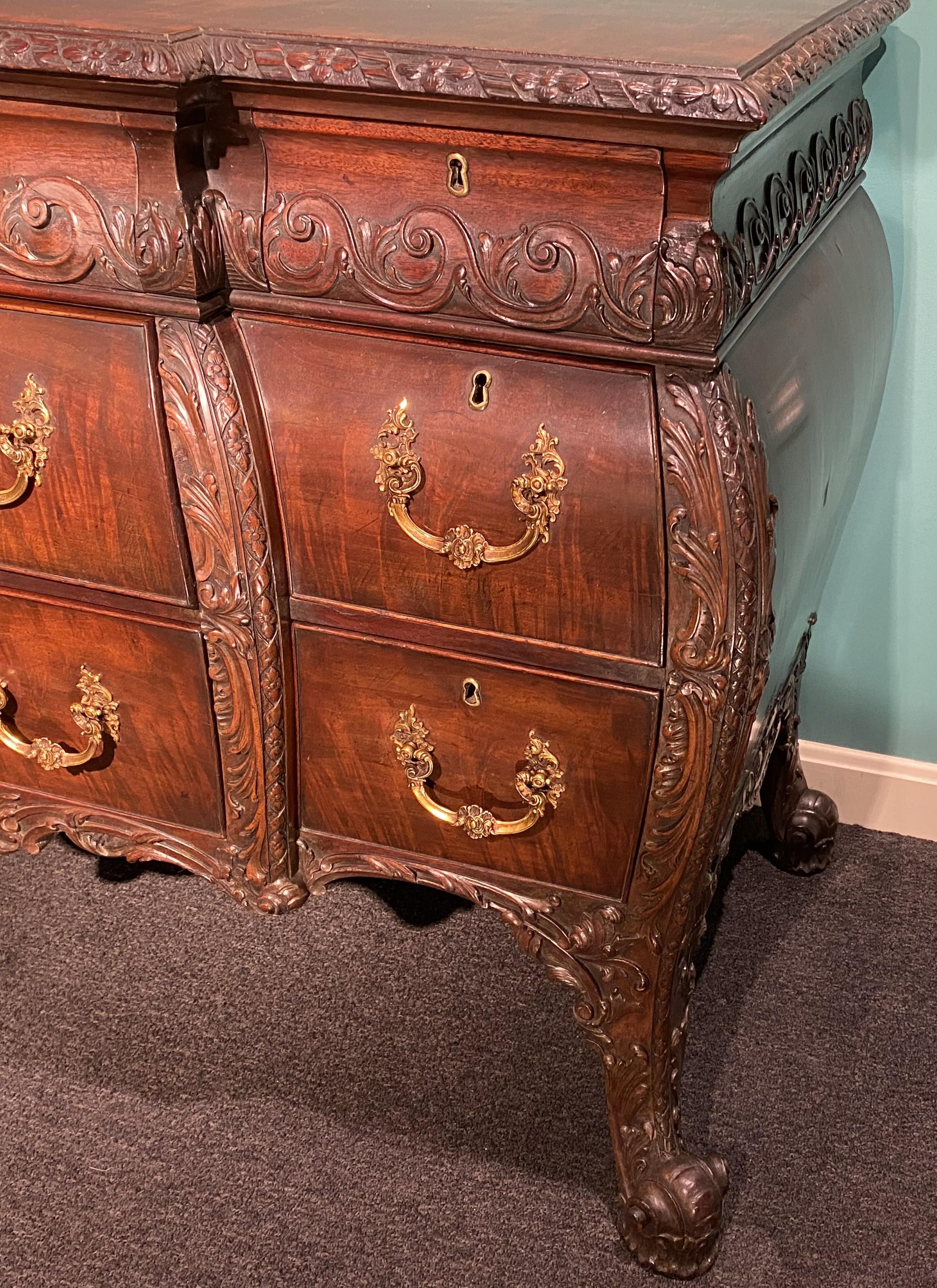 Brass 19th Century George II Style Carved Mahogany Commode in the Bombe Form For Sale