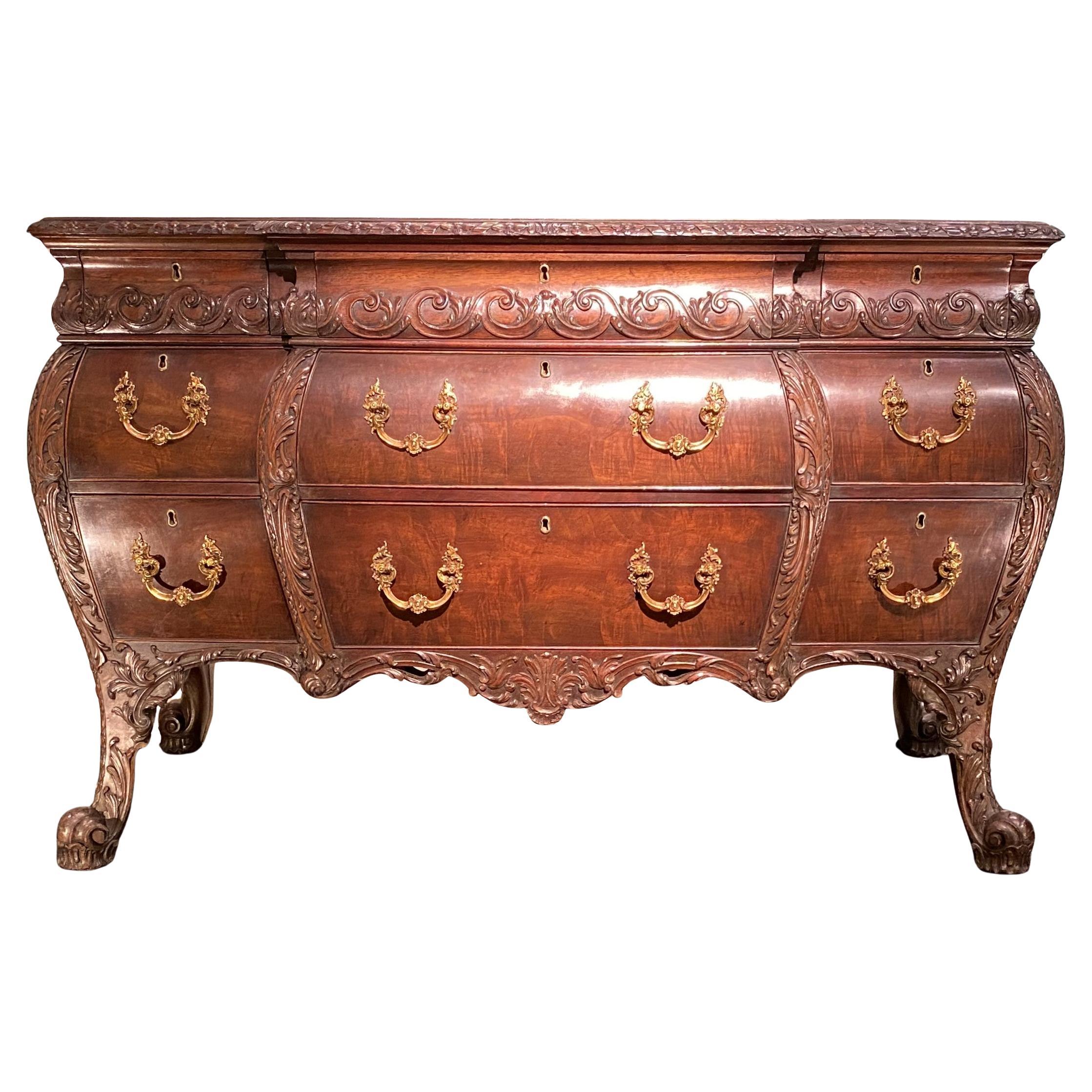 19th Century George II Style Carved Mahogany Commode in the Bombe Form For Sale