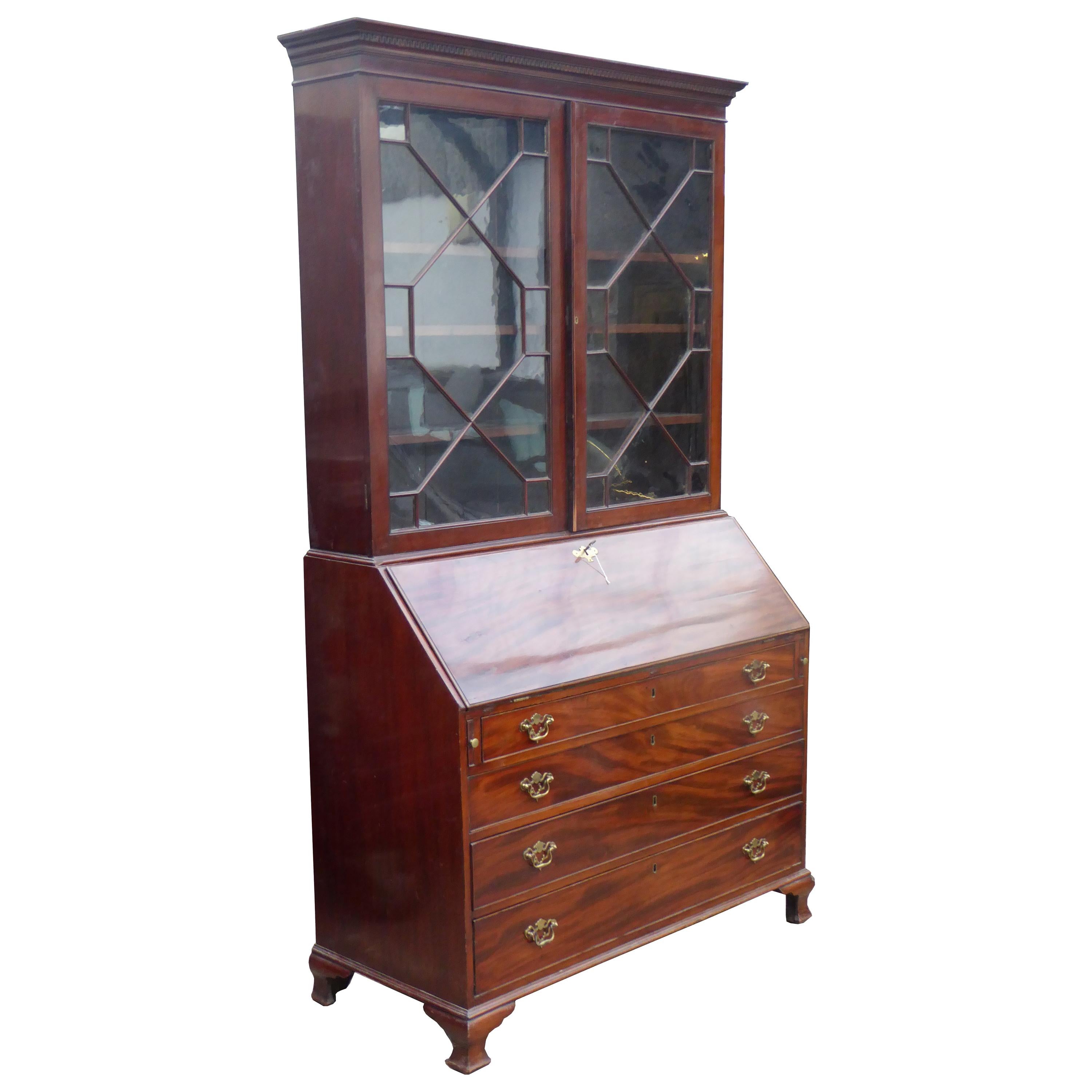 Tommi Parzinger Bookcase with Drawers and Pull Down Writing Desk at 1stDibs