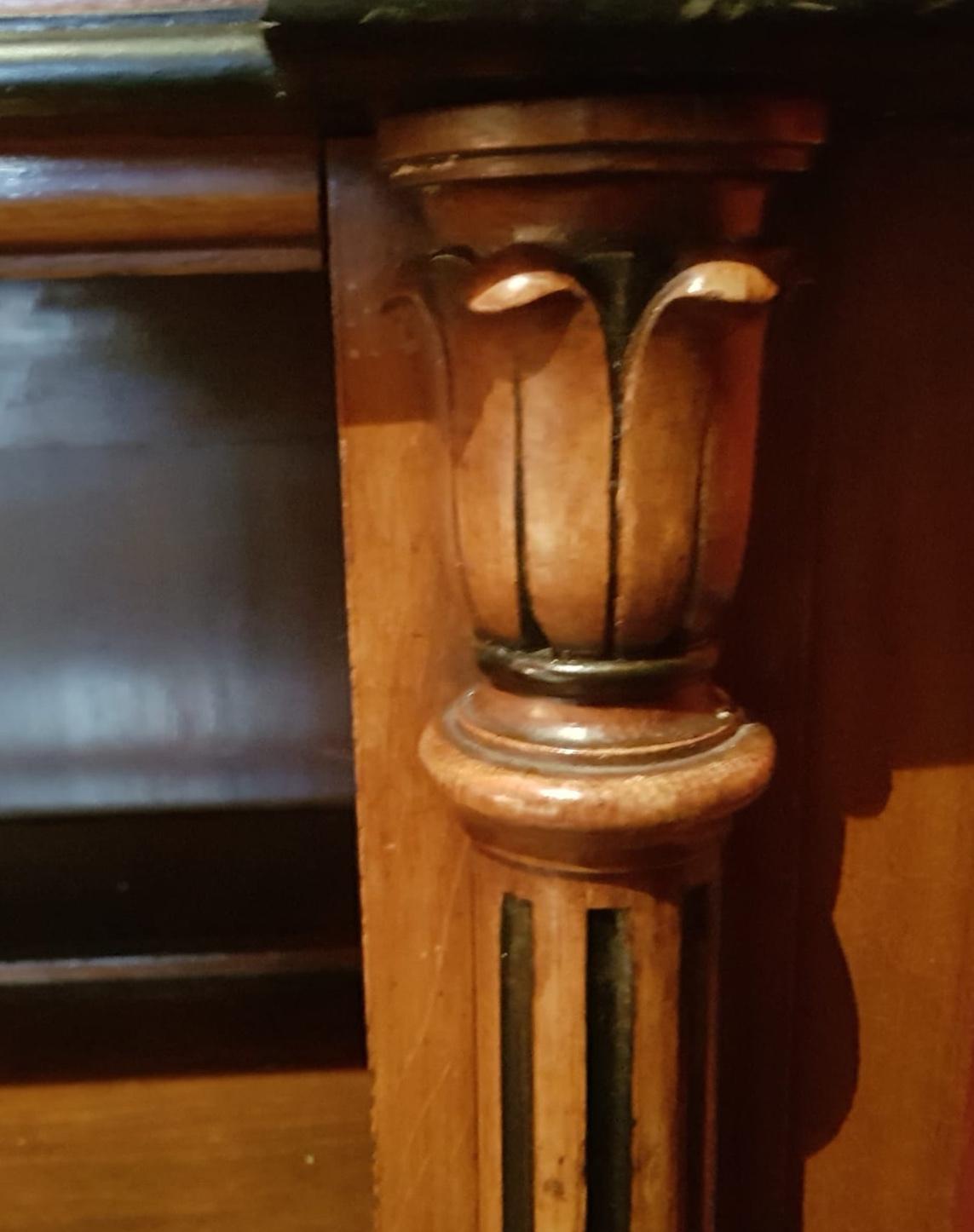 19th century George III open oak bookshelves with ebonized edges. There are three shelves giving four rows in total, made by Irish cabinet maker Robert Strahan (stamped by same, Strahan & Sons 1776-1890).