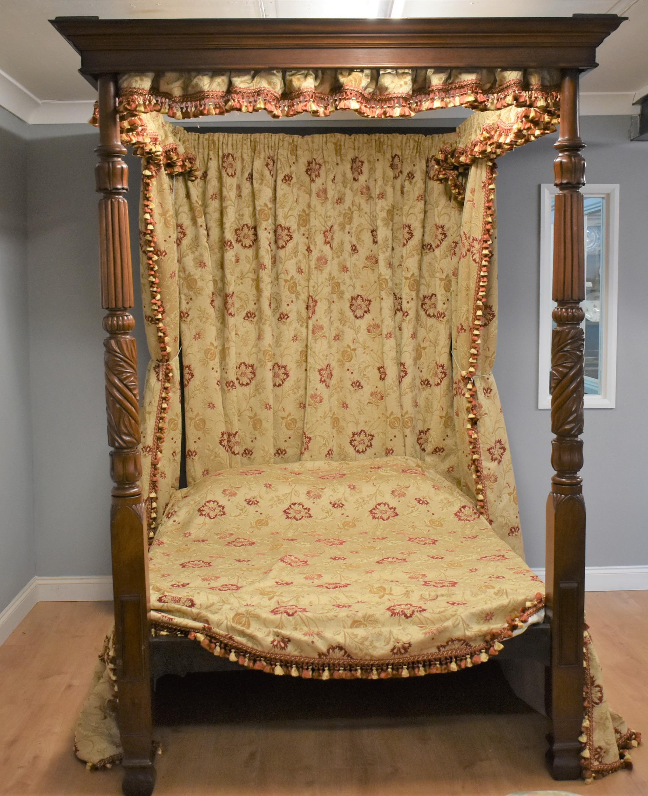 For sale is a good quality George IV mahogany four poster bed, having a stepped canopy, on turned and reeded supports, complete with a fine silk brocade drapery. The bed is in very good condition, with minor wear commensurate with age and