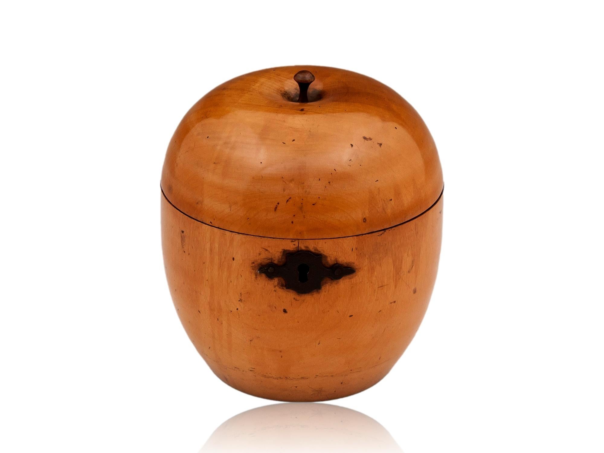 Shaped as an Apple

From our Tea Caddy collection, we are delighted to offer this superb Georgian Apple Treen Tea Caddy. The Tea Caddy carved from Treen as a novelty Apple with a button stalk, shaped body and shaped cut steel escutcheon. When opened