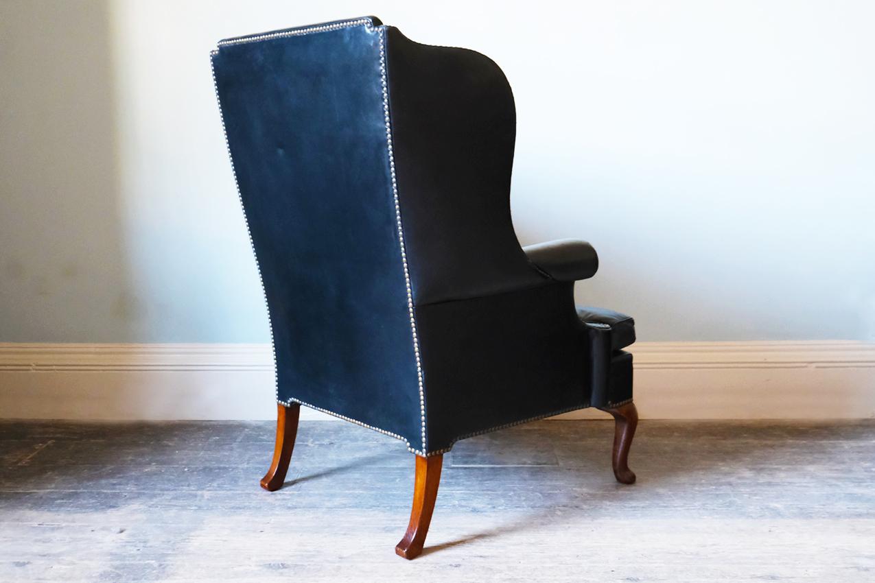 English 19th Century Georgian Black Leather-Upholstered Wingback Armchair For Sale