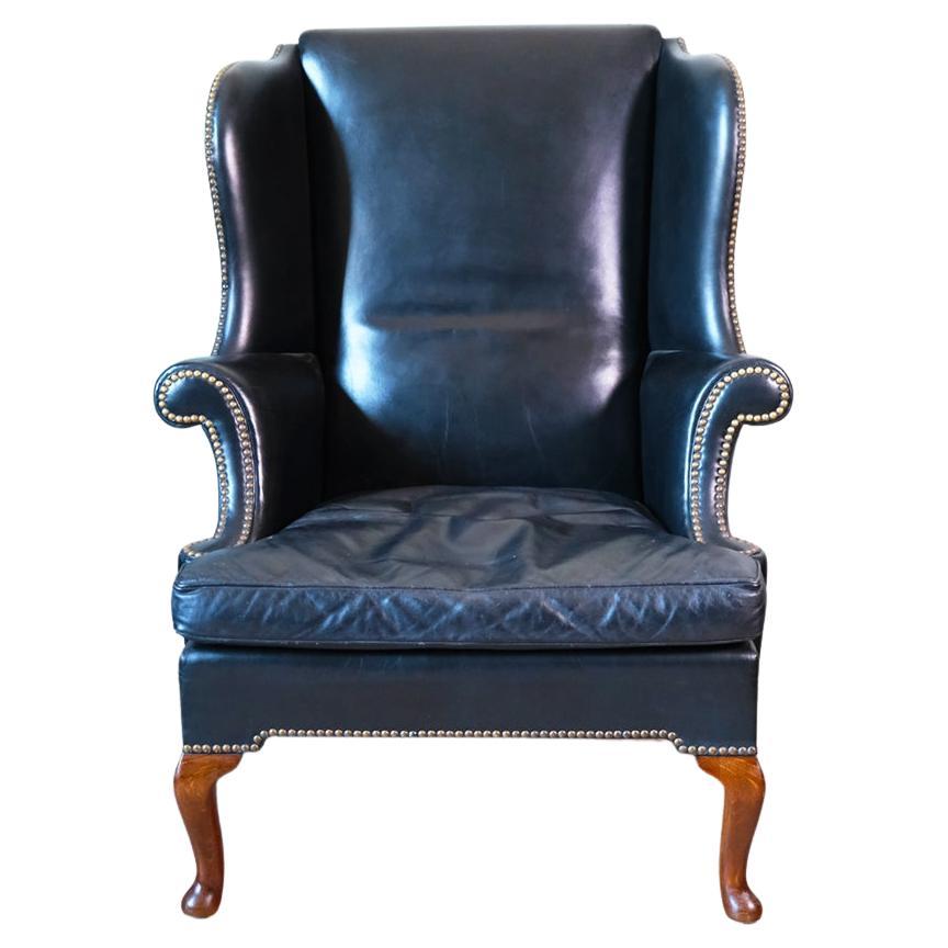 19th Century Georgian Black Leather-Upholstered Wingback Armchair For Sale