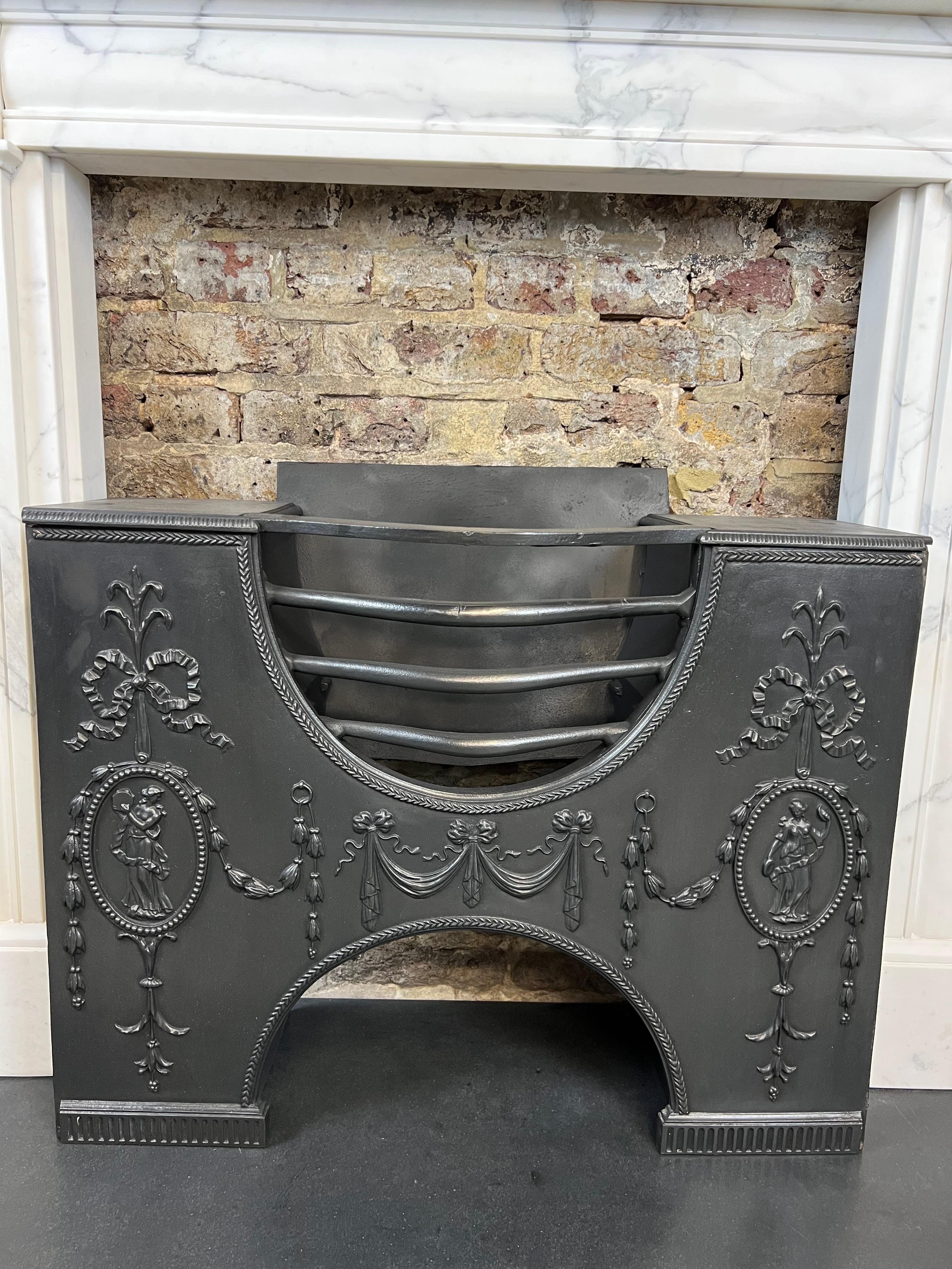 19th Century Georgian Cast Iron Hob Grate Fireplace.
Fine Example Of An Early to Mid 19th Century Cast Iron Fireplace Interior. 
Also Known As A Half Hob Grate Fitted Within A Mantlepiece and Or Just A Cavity. 
Typical Decorative Cast-iron Features