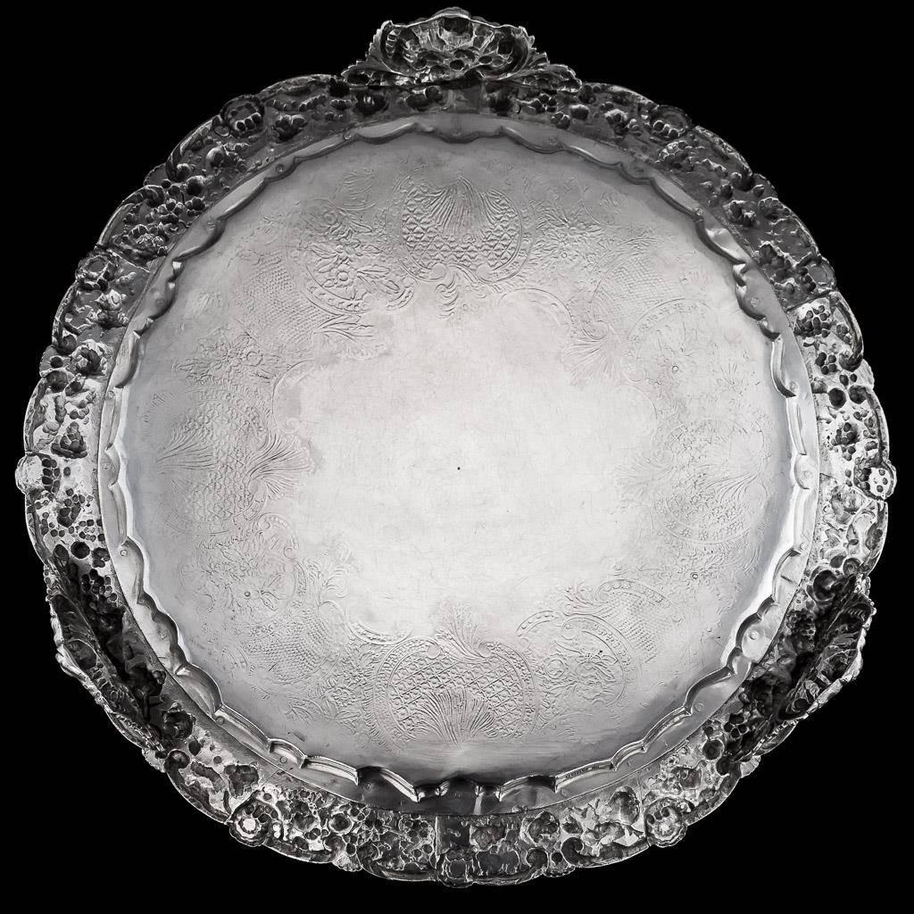 Description:

Antique 19th century rare and exceptional George IV solid silver salver with cast border, impressively large size and extremely heavy gauge, of shaped-circular form on three impressive cast feet, with applied cast border depicting