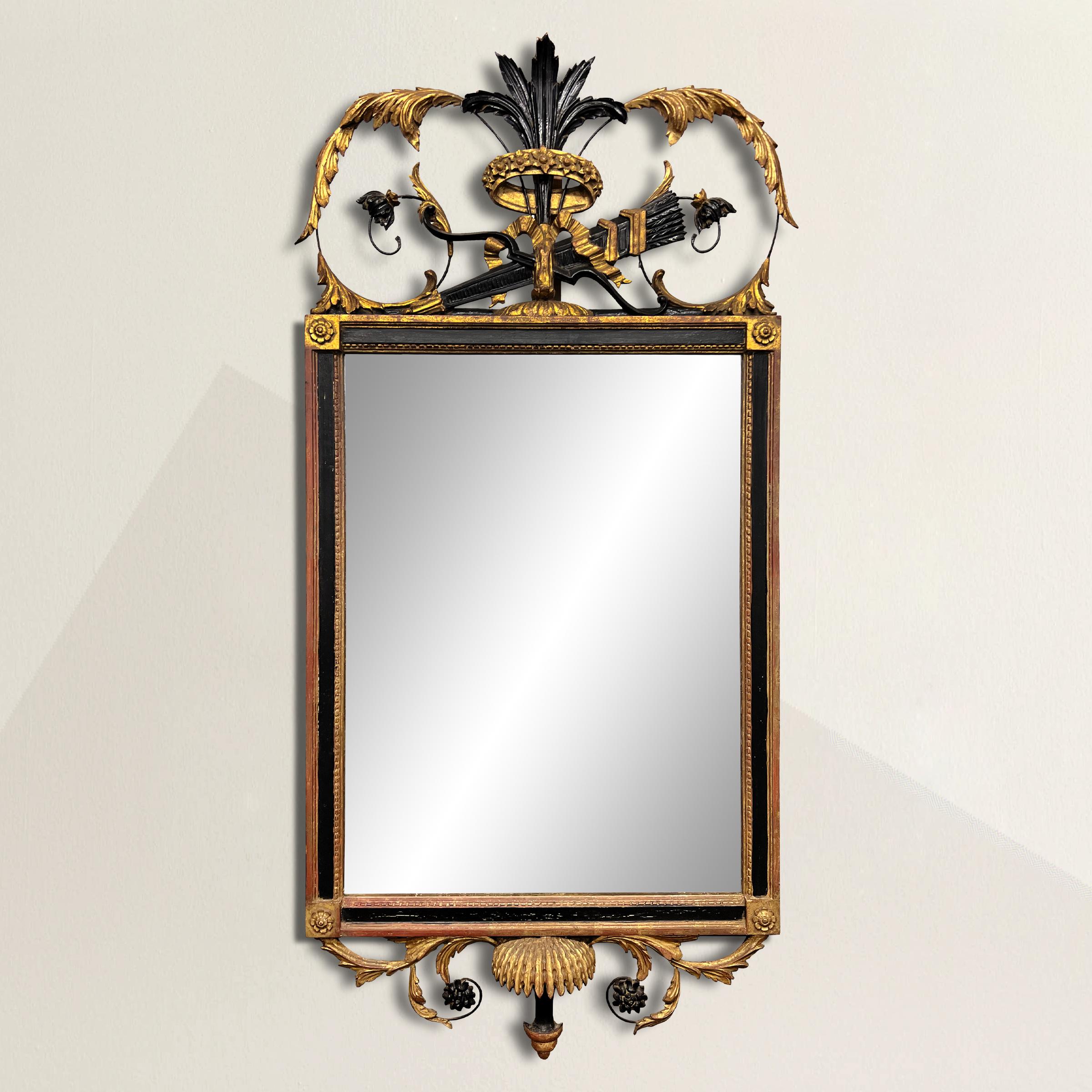 Immerse yourself in the grandeur of the English Georgian period with this captivating 19th-century English Georgian framed mirror. Reflecting the opulence and sophistication of the era, its elaborate crest takes center stage, adorned with a crown