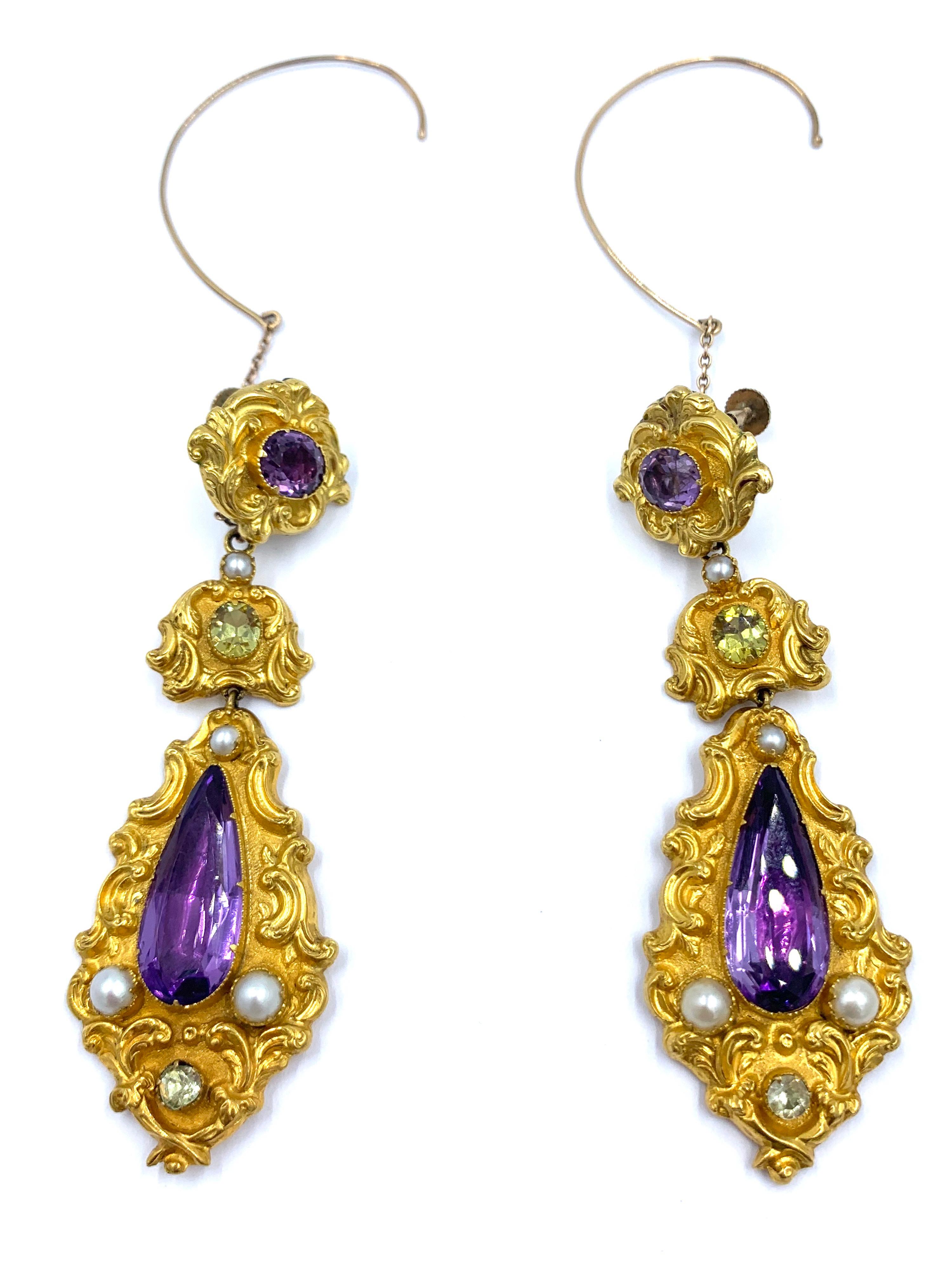 Beautiful and classic Georgian Period 18kt yellow gold earrings. These vintage dangle earrings feature amethyst stones as well as a peridot and pearls. Beautifully crafted real Georgian Period jewelry. These earrings are currently fashioned with an