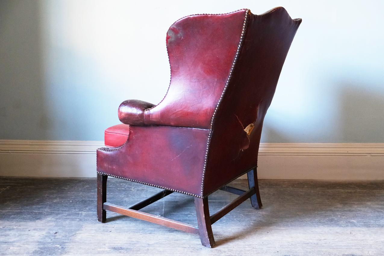 Metal 19th Century Georgian Red Leather-Upholstered Wingback Armchair For Sale