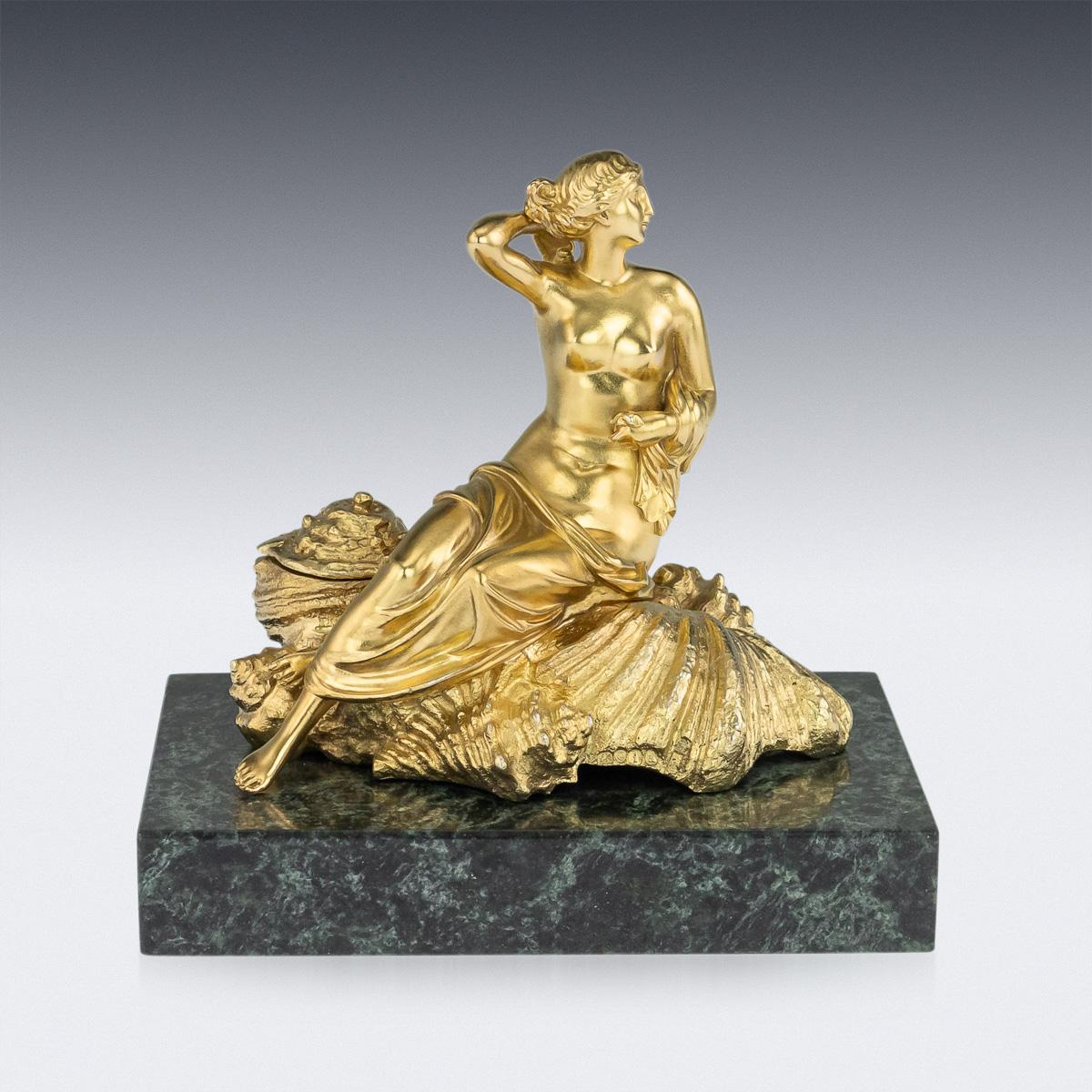 Antique 19th century Georgian solid silver-gilt on green marble inkwell depicting the birth of Venus (Aphrodite). Reclining and bare chested on a mount of shells, with one shell applied with a hinged lid, revealing an inkwell