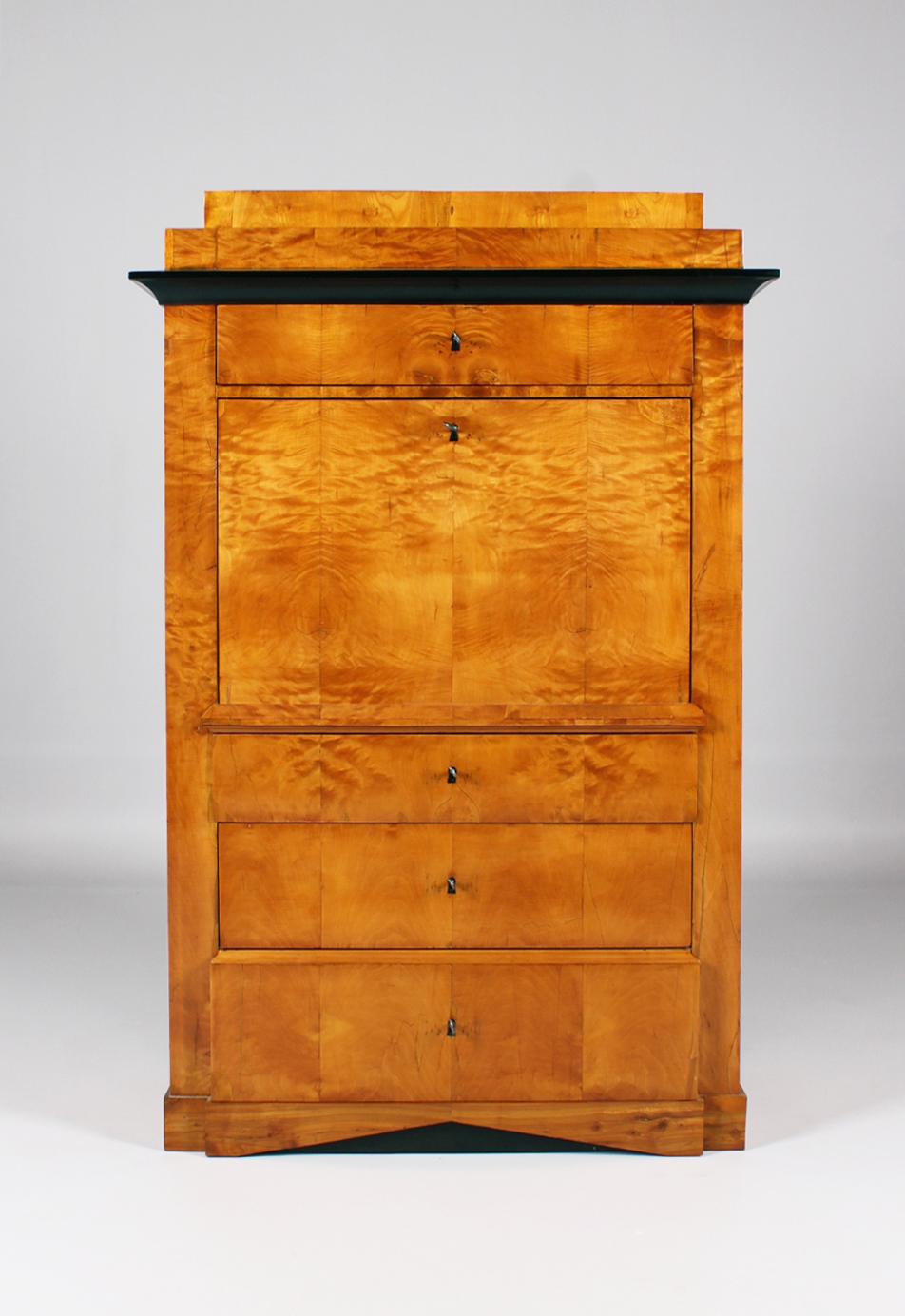 Plain Biedermeier secretary

Middle Germany
Birch
Biedermeier around 1830

Dimensions: H x W x D: 162 x 104 x 49 cm

Description:
Secretary standing on a skirting board with three drawers at the bottom, the writing flap above and another