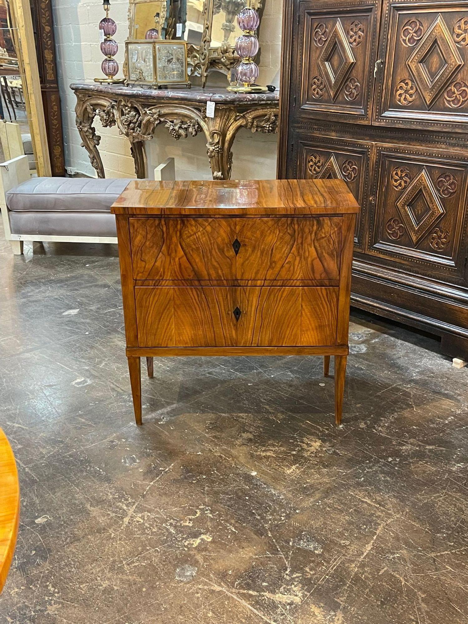 Handsome 19th century German Biedermeier black walnut chest. Beautiful finish and wood grain on this piece. Exceptional!