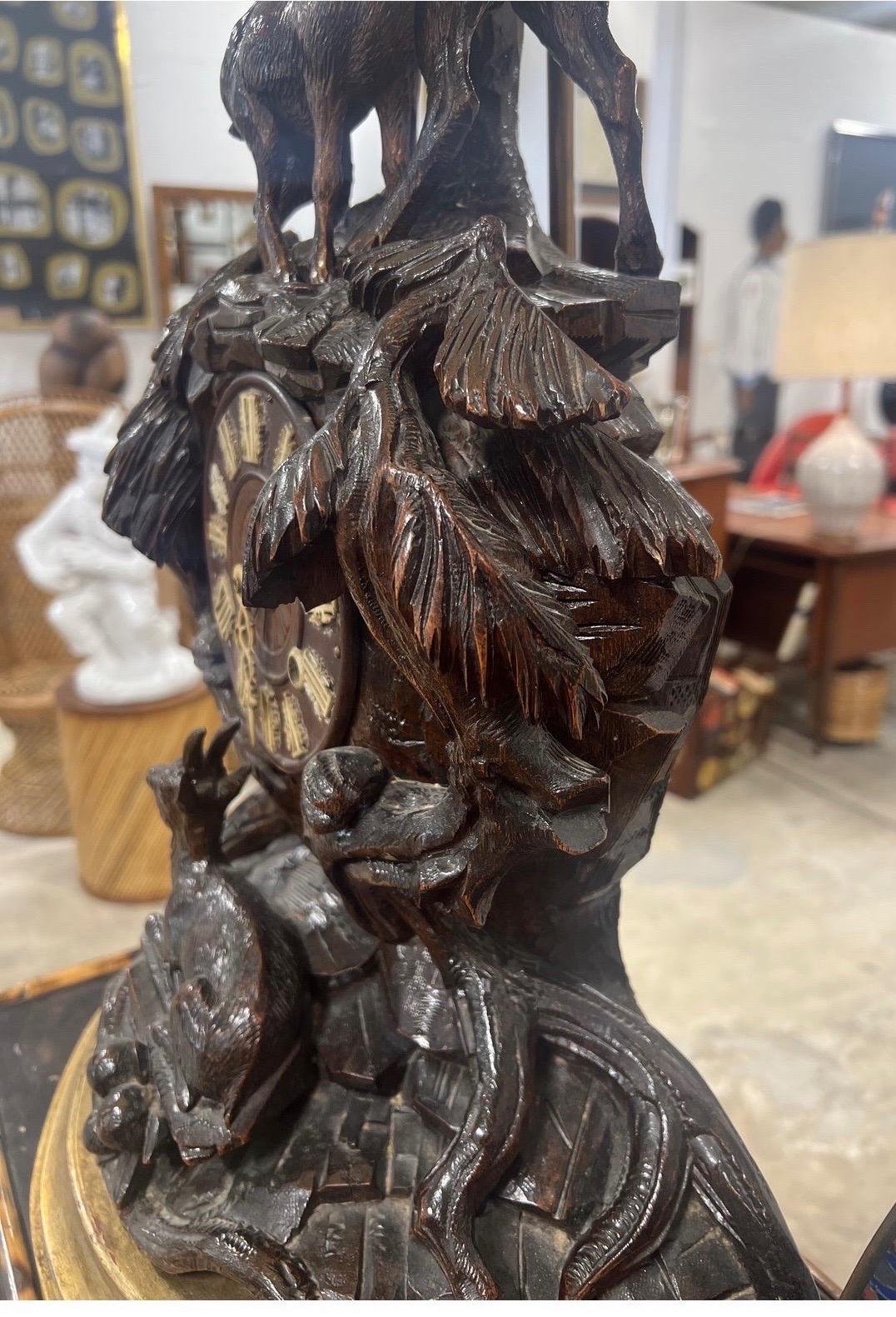Quartz 19th Century German Black Forest Carved Clock Mounted Lamp with Cowhide Shade For Sale
