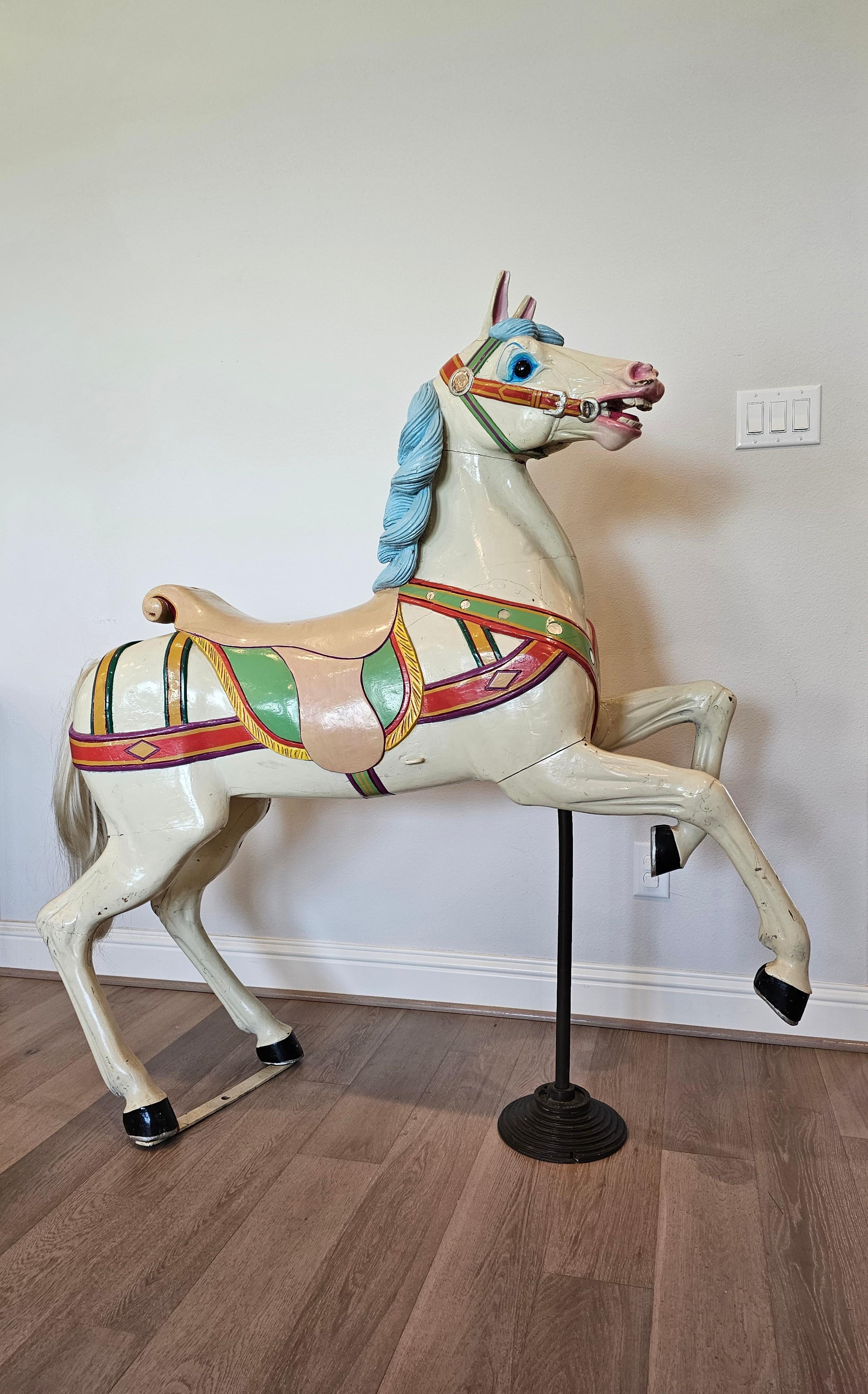 A rare antique, circa 1890s, German hand carved and painted wood carousel horse carnival fair ride by Peter Schneider (famous for making the first double decker carousel in 1898).

Exquisitely hand-crafted by Philip Schneider in Frankfurt,