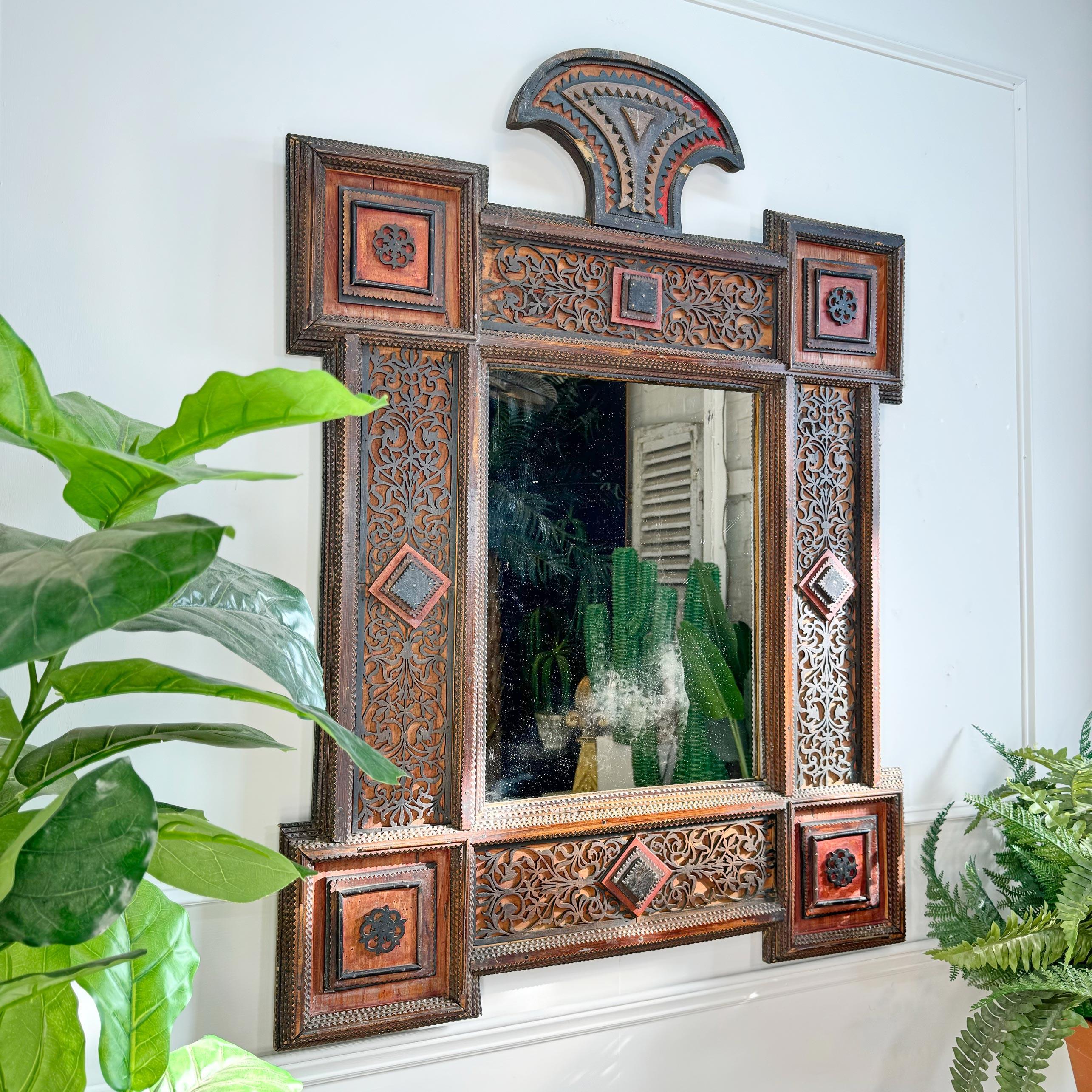An incredibly rare and decorative mid-19th century German Tramp Art mirror, adorned with removable crest and stunning fretwork detailing throughout. This is an important example of Northern European Tramp / Folk Art, Dating to circa 1870.



it is