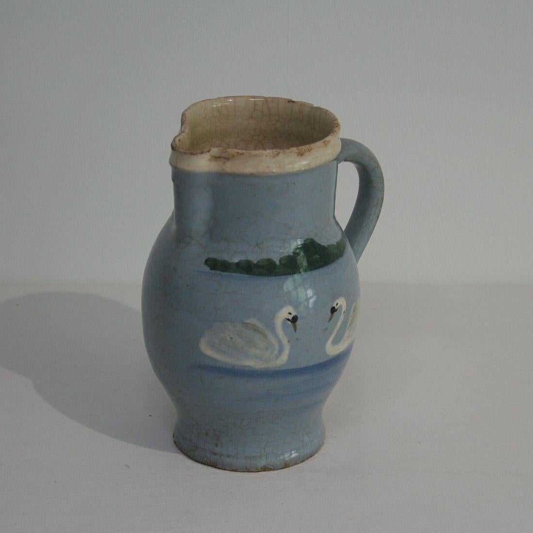 Beautiful and very rare glazed earthenware jug, Germany, circa 1850. Weathered.