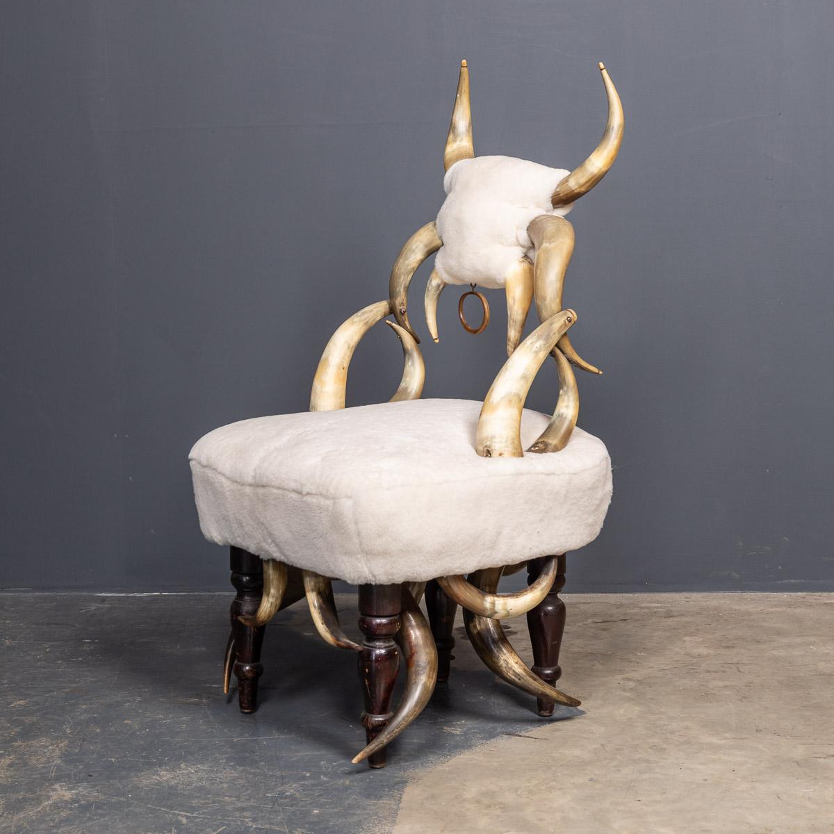 Antique 19th century very unusual hall chairs fashioned from bull horns. These chairs are usually from the Swiss / German borders (the Black Forest) and we a fashionable home decoration accessory in the latter part of the 19th century. Much of this