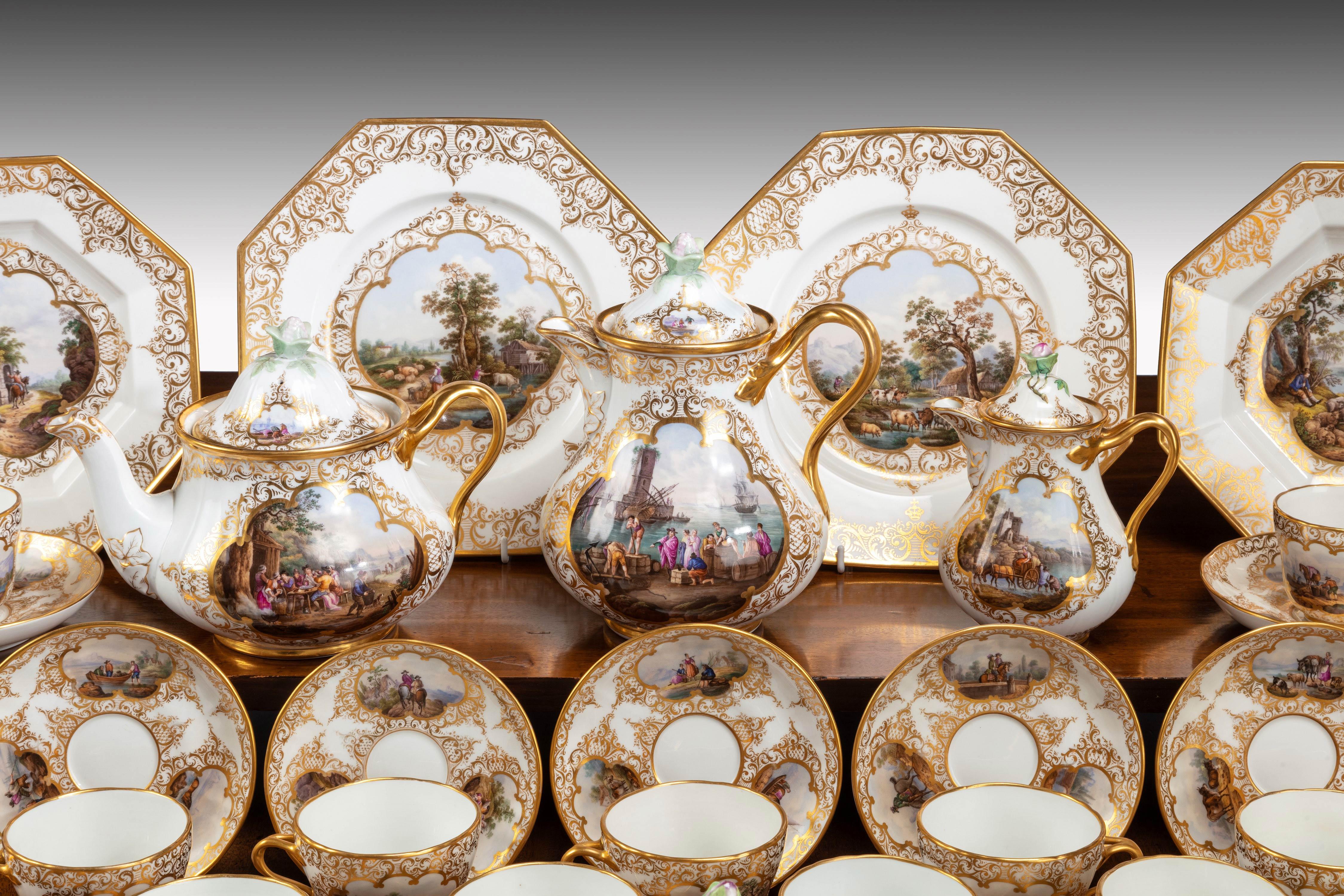 German KPM porcelain coffee and tea service decorated in colors and gold with scenic images in each cartouche, Berlin, 1849-1870. 50 pieces.
Comprising:
One coffee pot
One teapot
One milk pitcher
One sugar bowl
11 tea cups and saucers
Ten coffee
