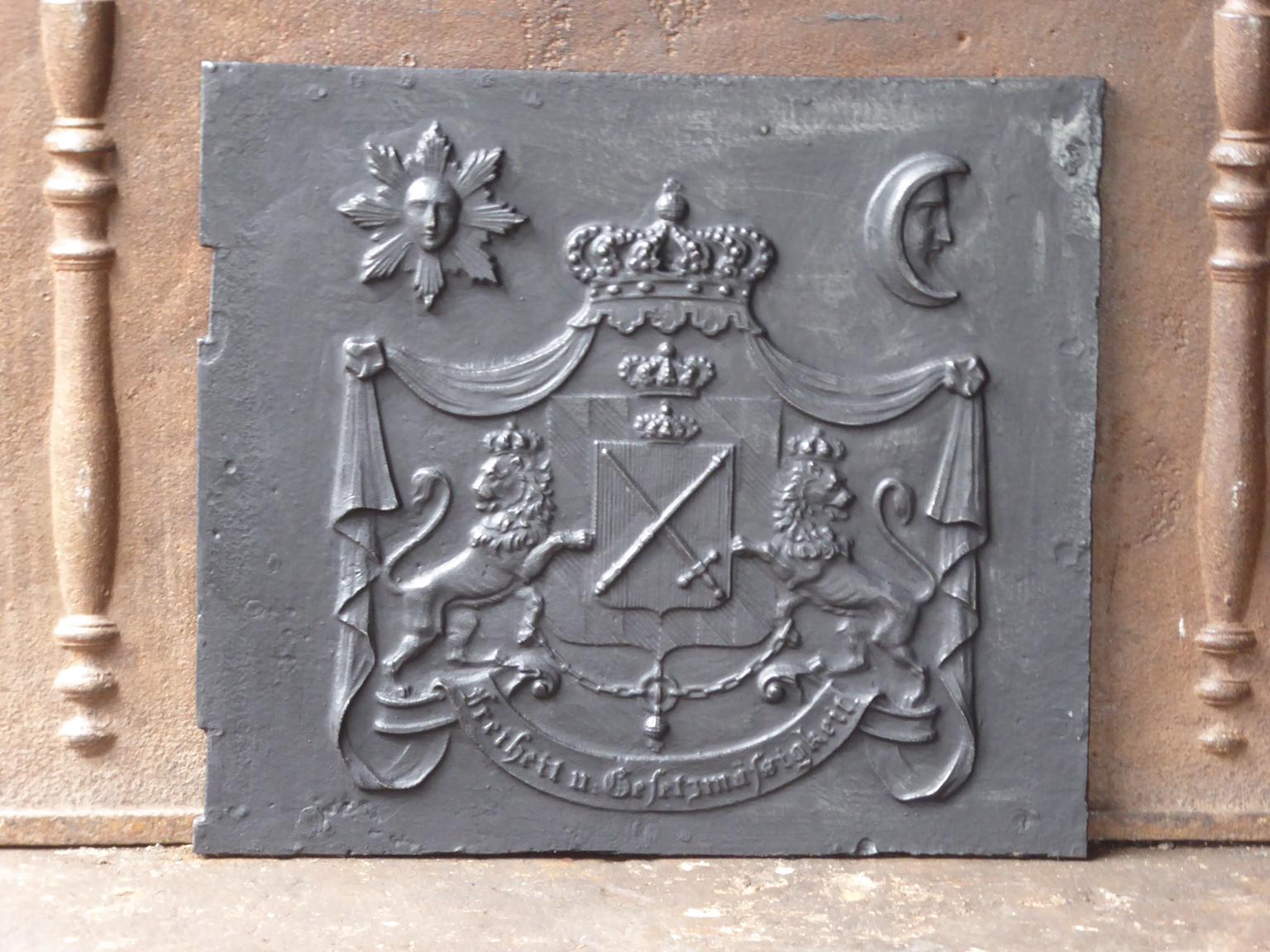 19th century German Napoleon II fireback with an unknown coat of arms. 

The fireback is made of cast iron and has a black / pewter patina. It is in a good condition and does not have cracks.







 