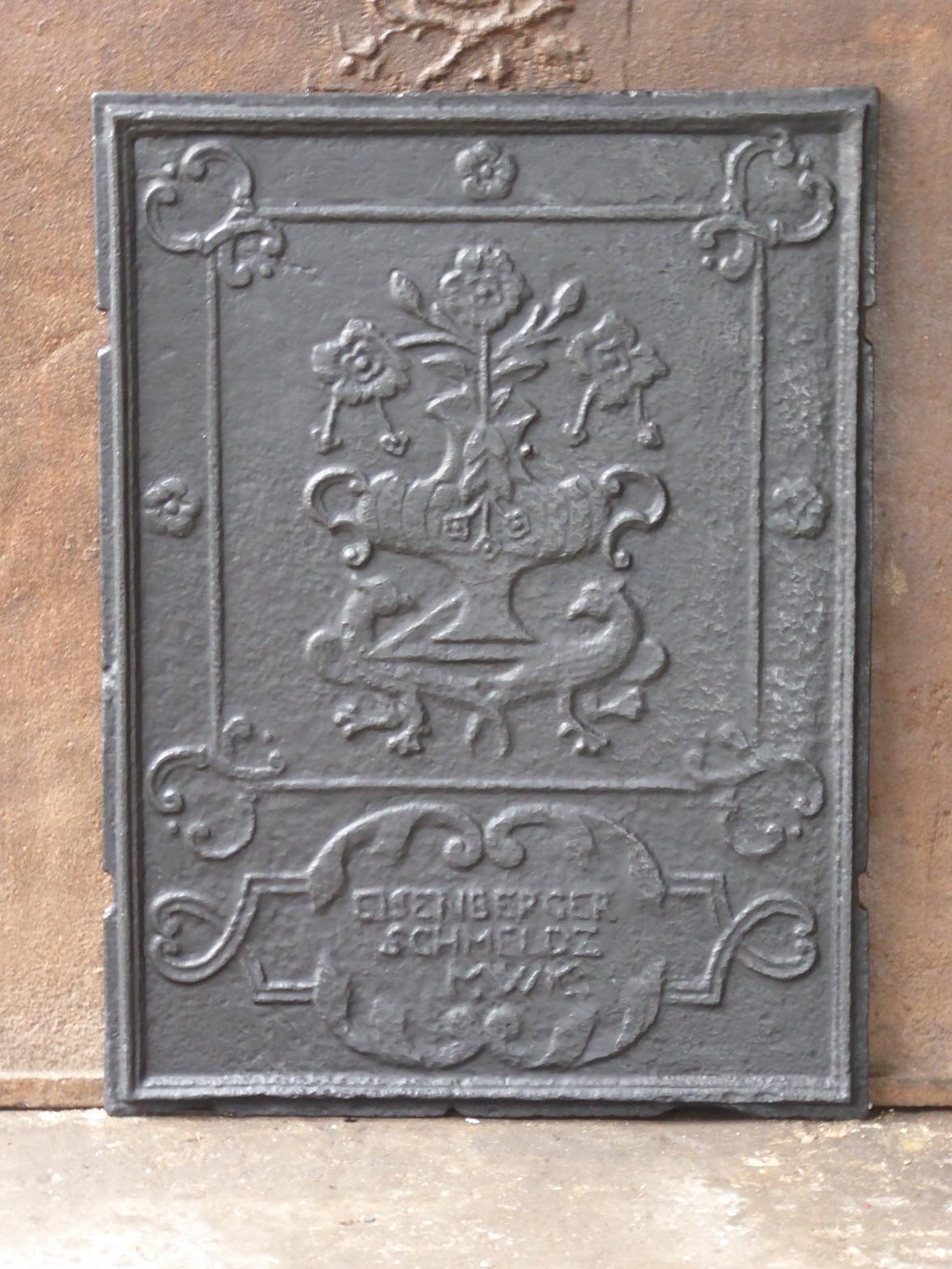 19th Century German Napoleon II period fireback with a flower basket.

The fireback is made of cast iron and has a black / pewter patina. The fireback is in a good condition, no cracks.







