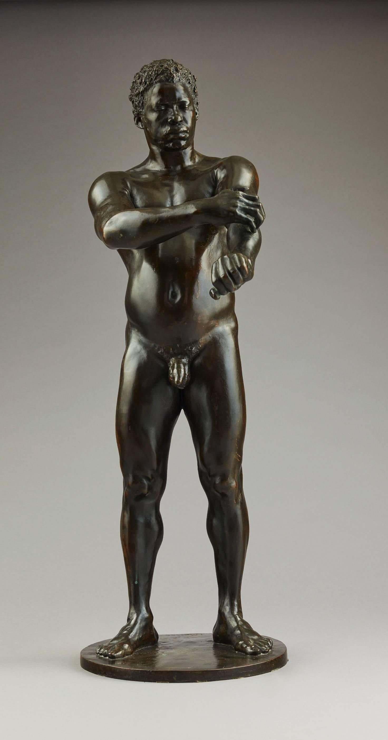 Bronze sculpture of a standing male nude athlete (original title 