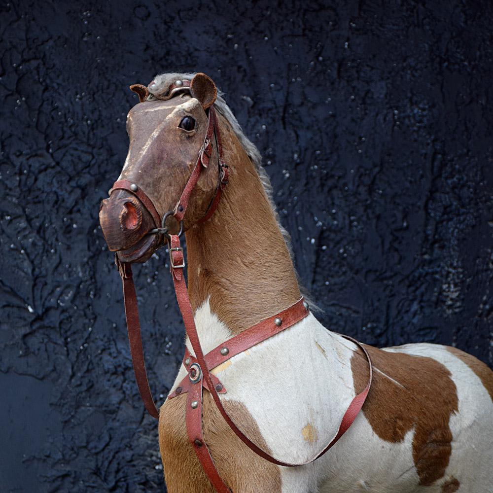 19th century German pony skin pull along horse toy 
A lovely example of 19th century German pony skin pull along horse toy. Skin-covered toys like this horse were the forerunners of the soft toys that emerged commercially in Europe in the late