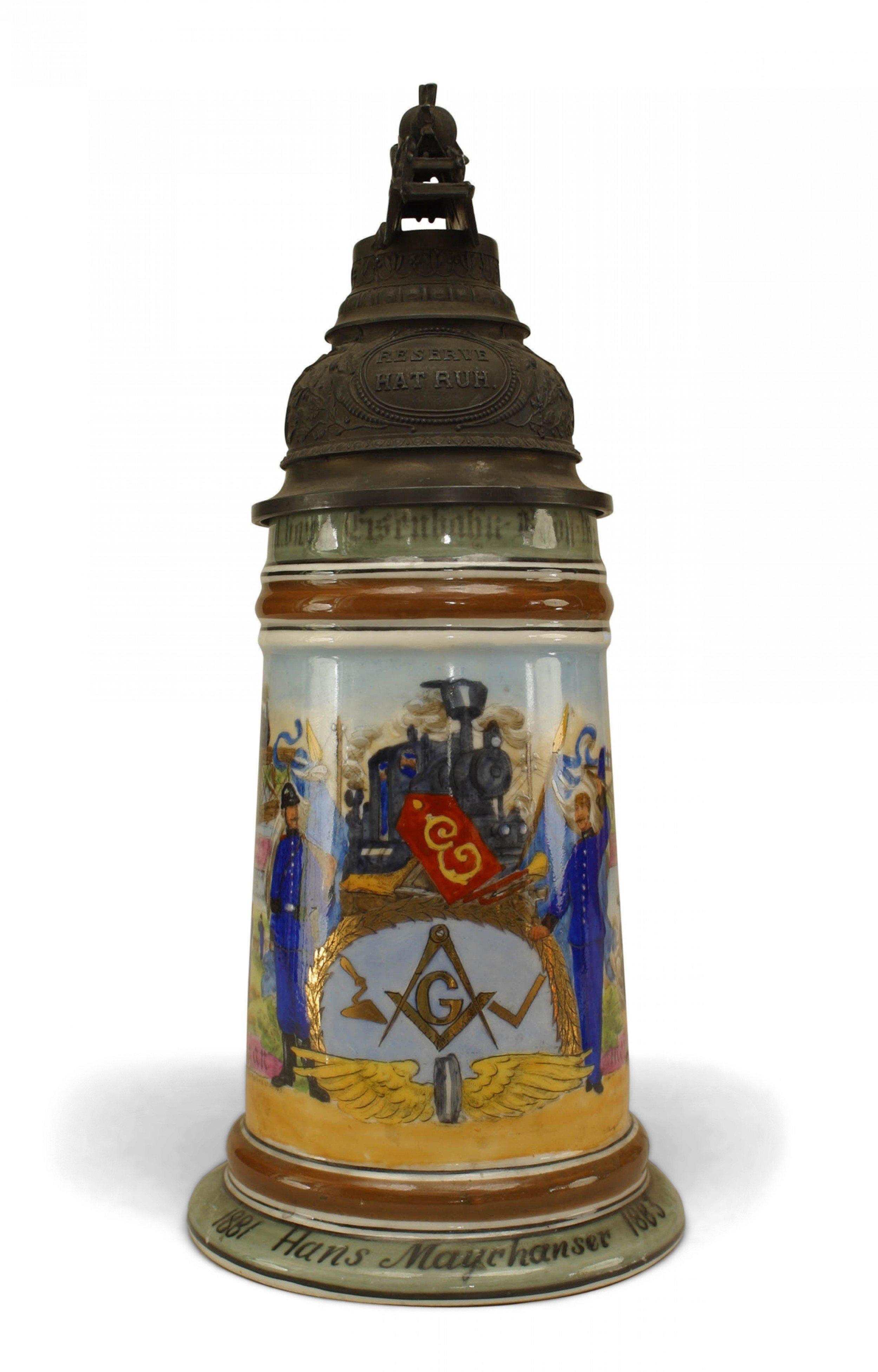 German porcelain beer stein with railroad scene and and pewter top with locomotive finial (1881).
 
