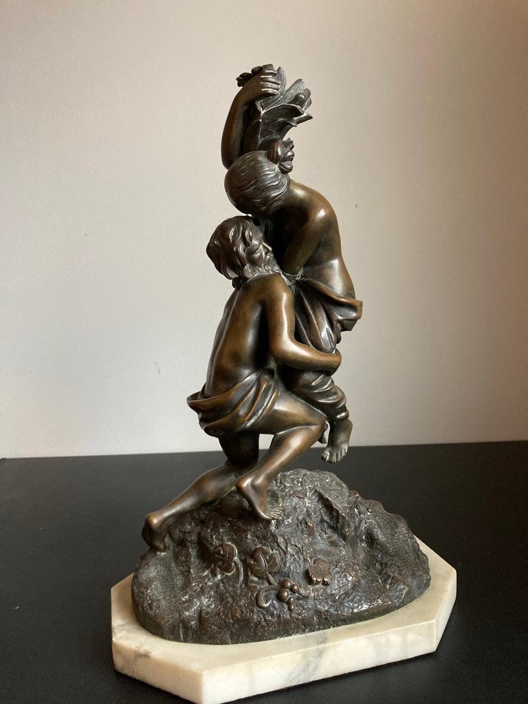 A beautifully cast bronze of an older man lifting a younger woman as she clings to a floral sheaf. An allegory of age and youth? Susannah and the Elders? It is hard to say what the allegory is in this compelling bronze. It is a fine cast done by an